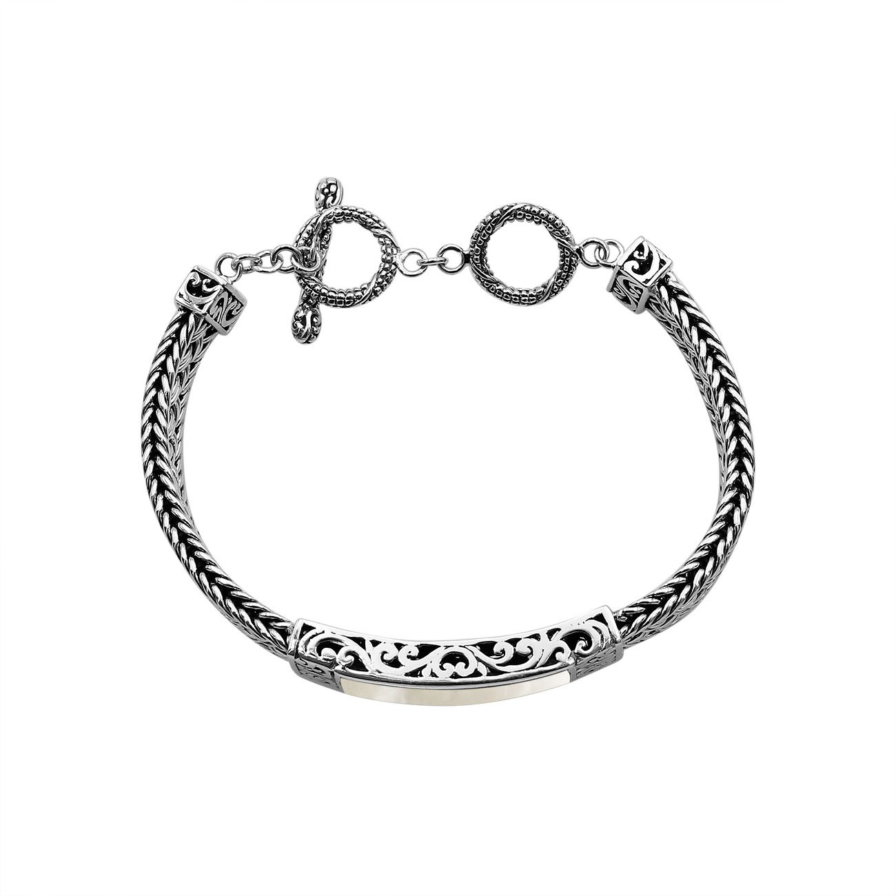 Handcrafted sterling silver bracelet with Mother Of Pearl inlay and toggle lock made in Bali.