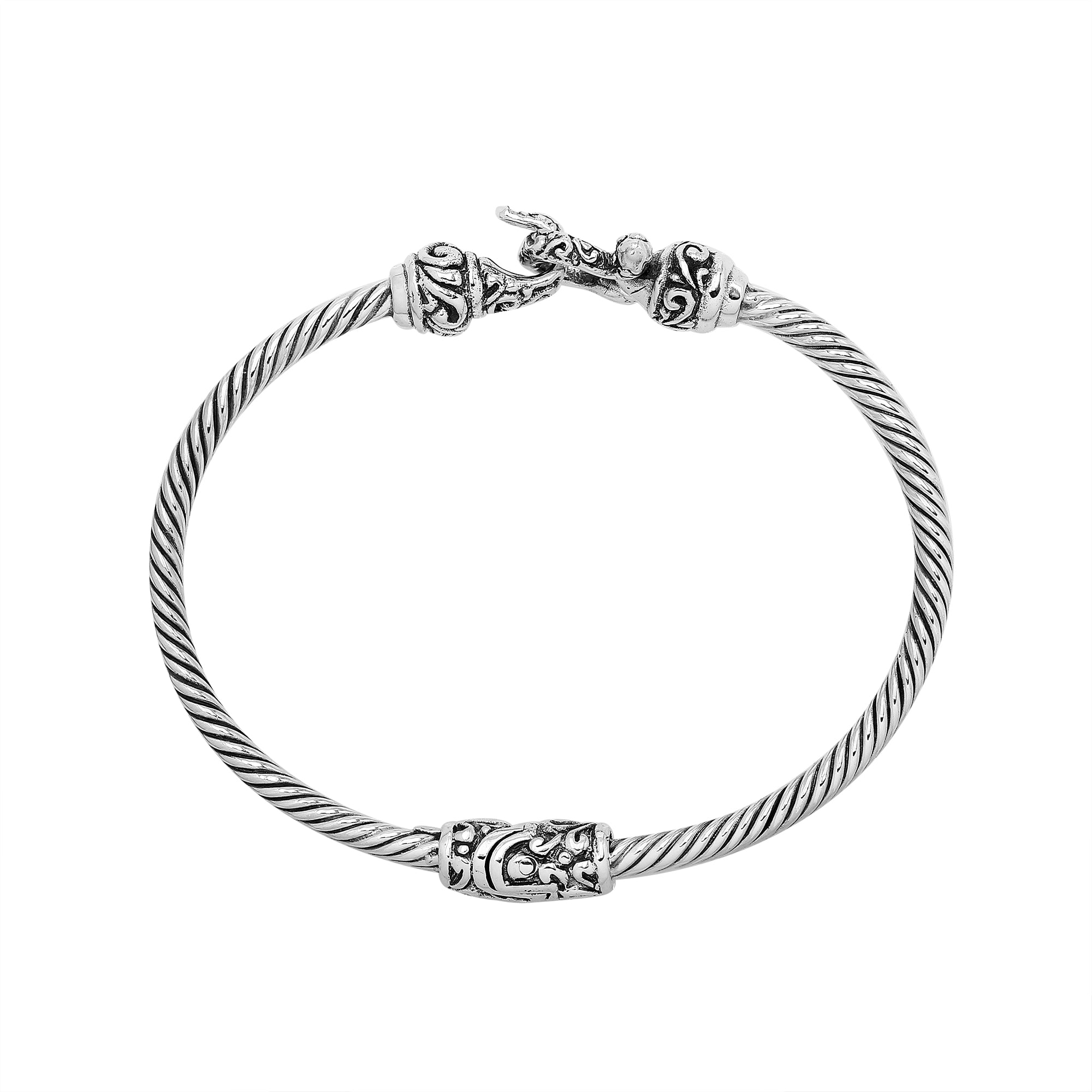 Handcrafted sterling silver Balinese hook bangle with twisted wire design made in Bali.