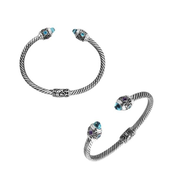 Handcrafted sterling silver bangle with Blue Topaz Quartz and Amethyst Quartz stones made in Bali.