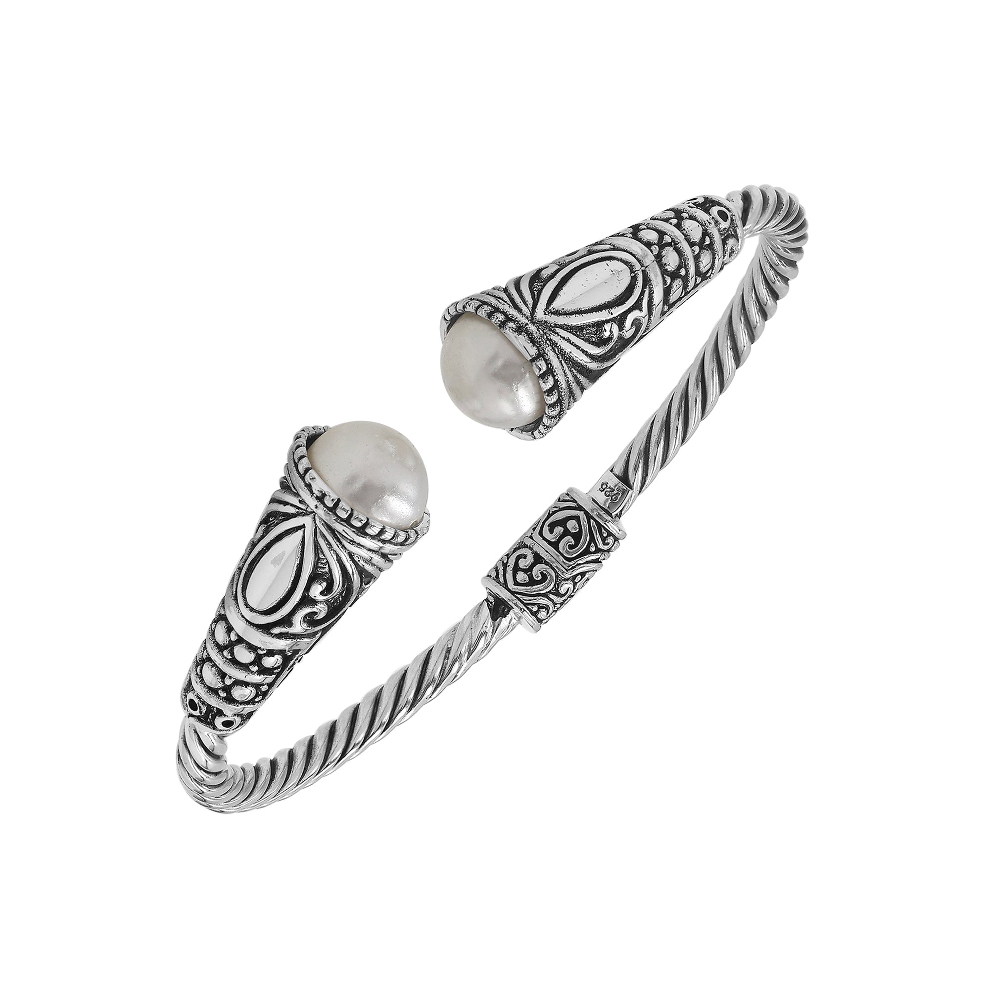 Elegant sterling silver open bangle with pearl accents and detailed Balinese pattern