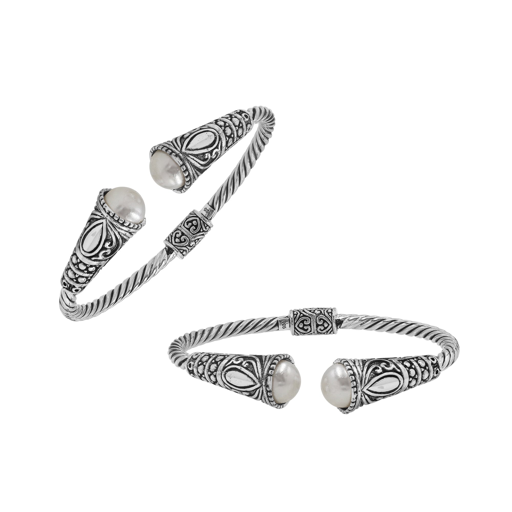 Elegant sterling silver open bangle with pearl accents and detailed Balinese pattern