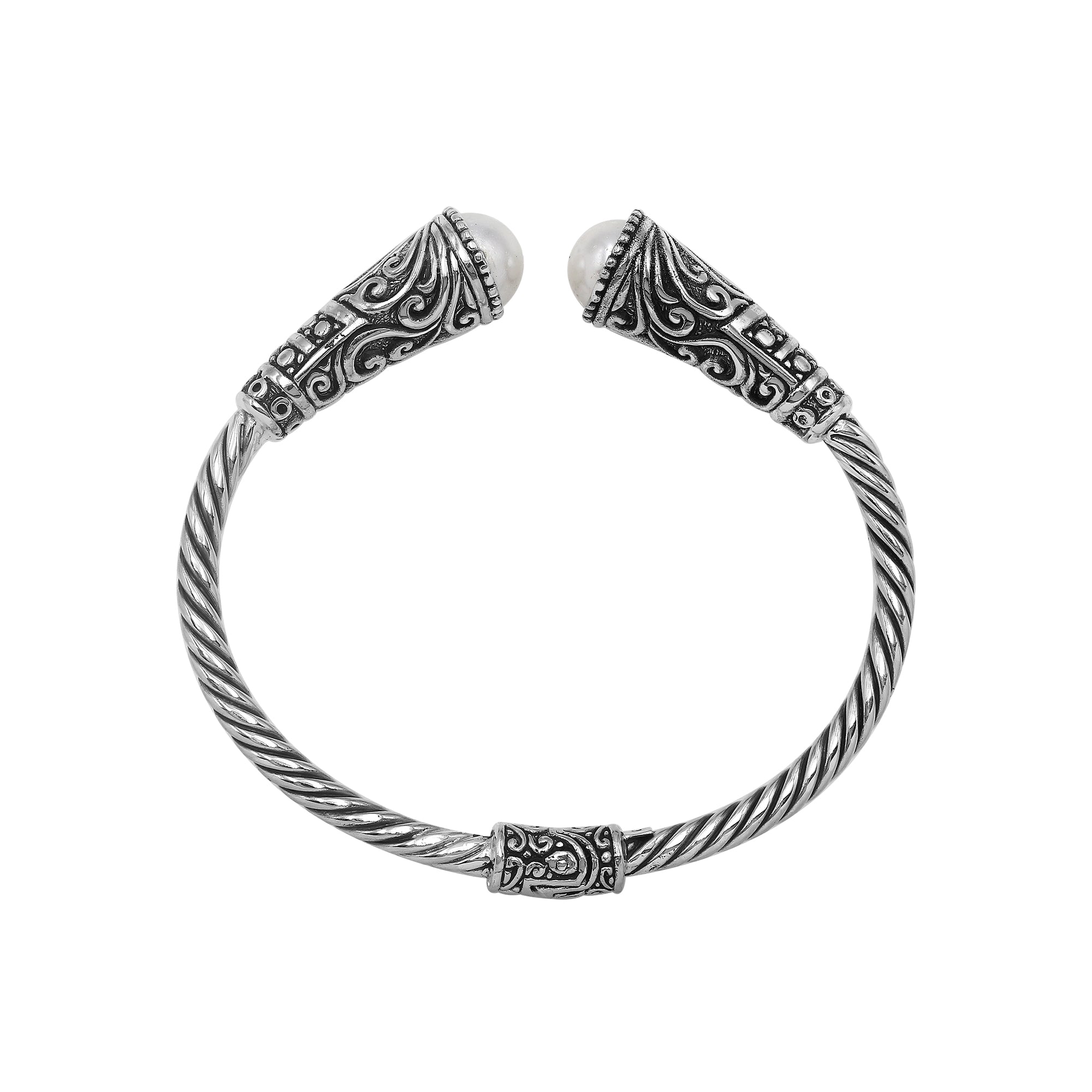Elegant sterling silver open bangle with pearl accents and detailed Balinese pattern