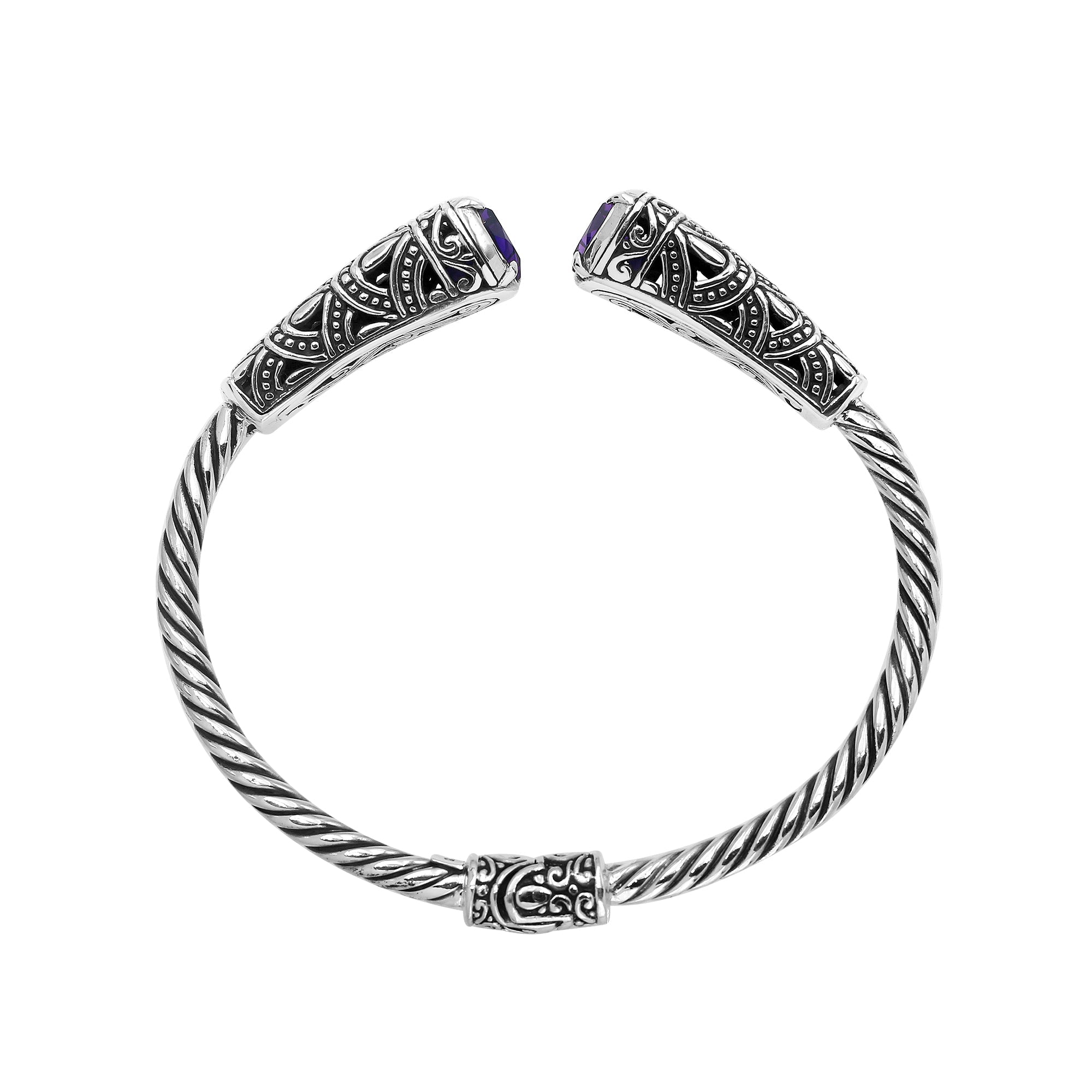 Elegant sterling silver open bangle with amethyst quartz accents and Balinese pattern