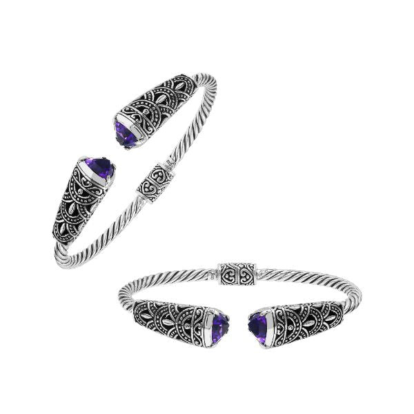 Elegant sterling silver open bangle with amethyst quartz accents and Balinese pattern
