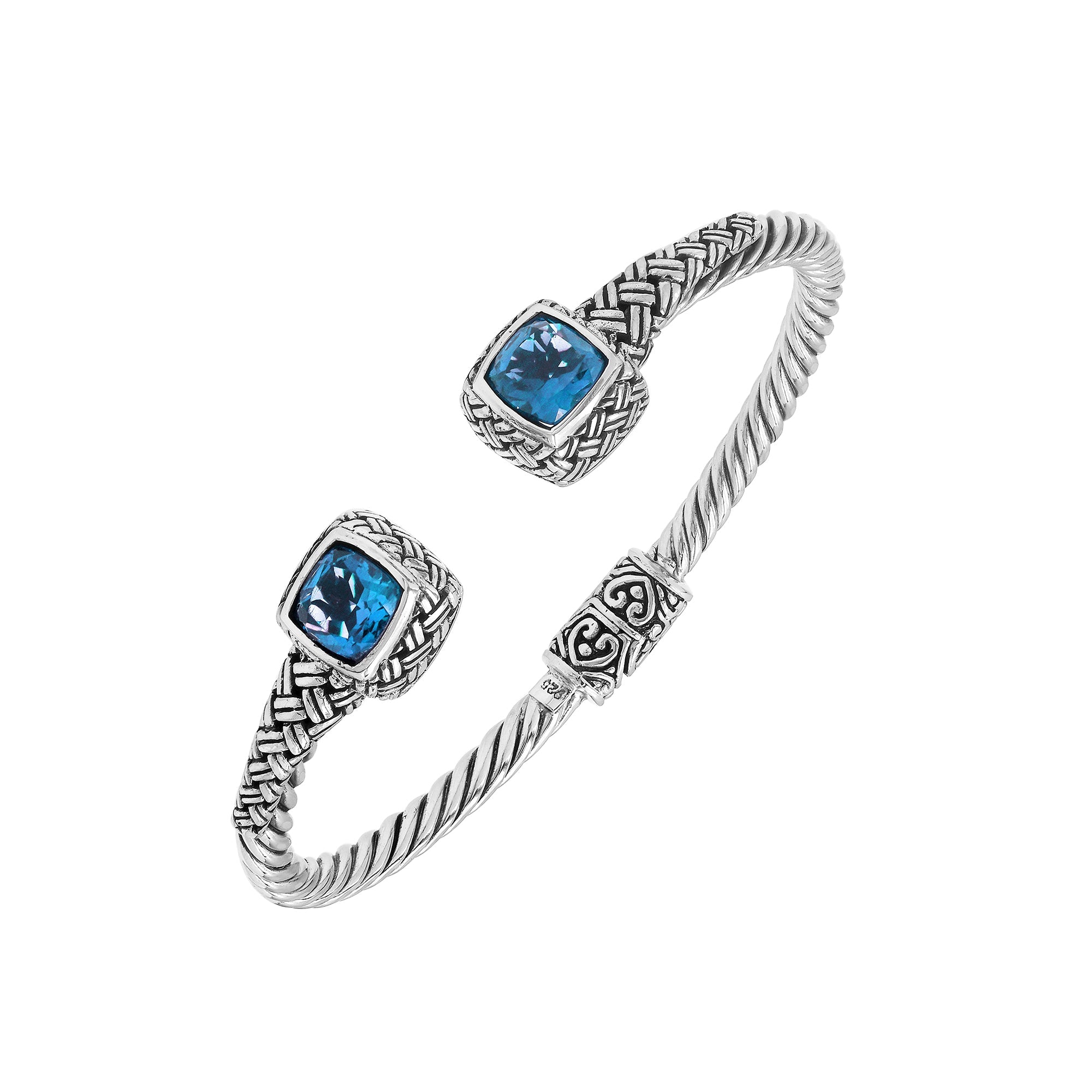 Elegant sterling silver braided bangle with blue topaz quartz accents and intricate Balinese pattern