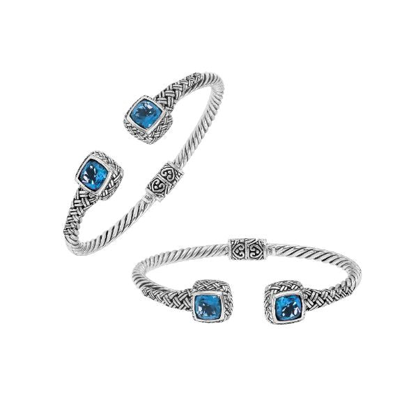 Elegant sterling silver braided bangle with blue topaz quartz accents and intricate Balinese pattern