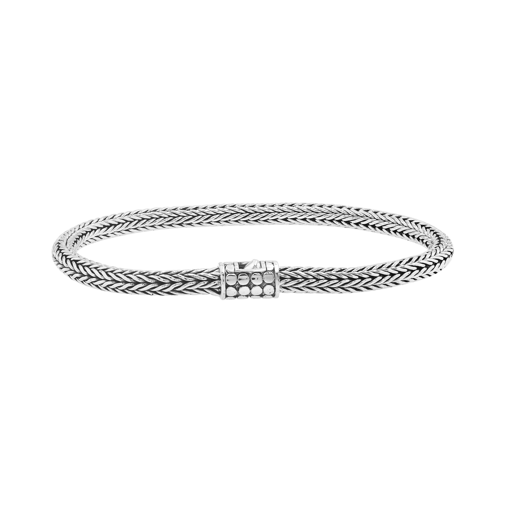 Elegant sterling silver wheat chain bracelet with dotted Balinese clasp and polished finish