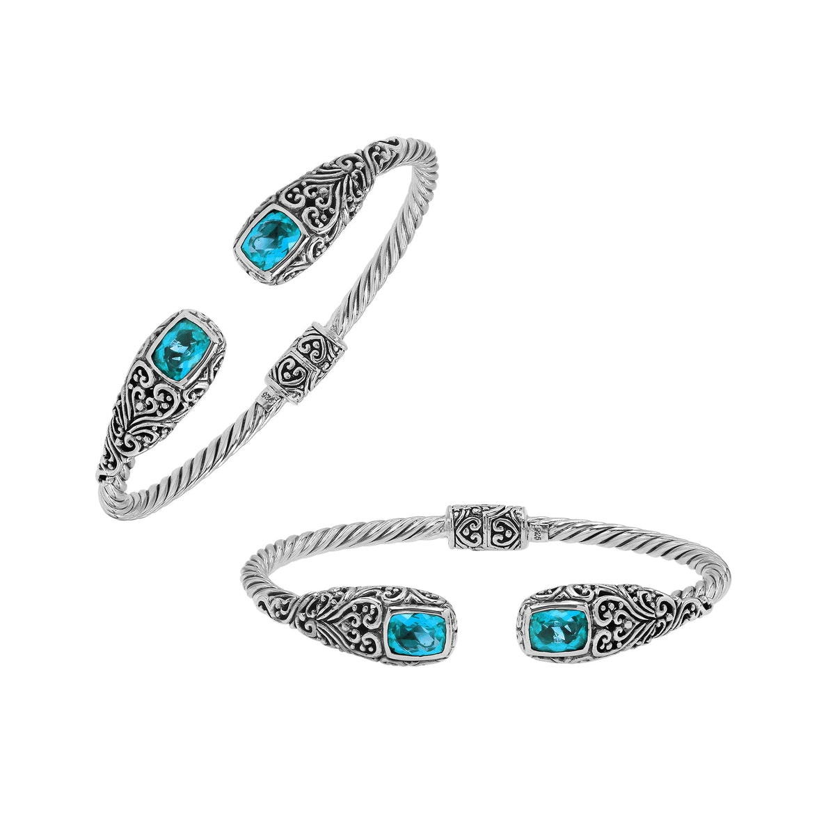 Elegant sterling silver open bangle with blue topaz quartz accents and Balinese engraved pattern