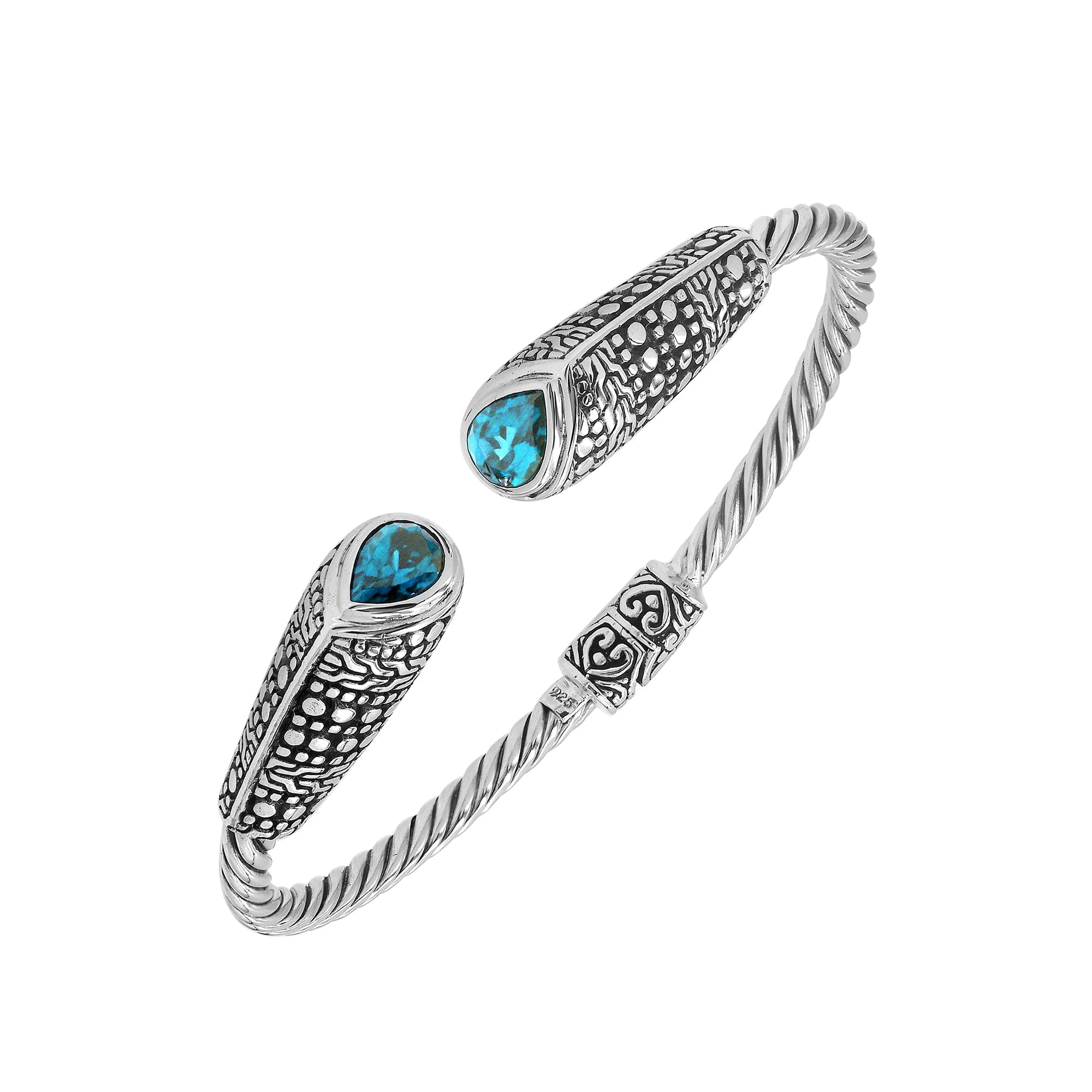 Elegant sterling silver open bangle with blue topaz quartz accents and Balinese dot design