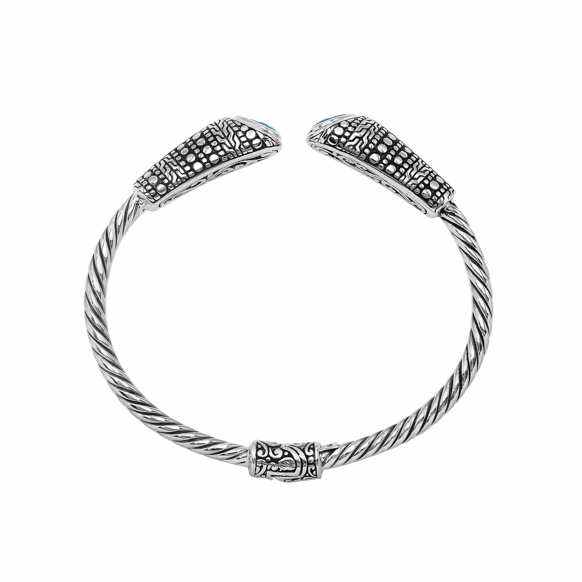 Elegant sterling silver open bangle with blue topaz quartz accents and Balinese dot design