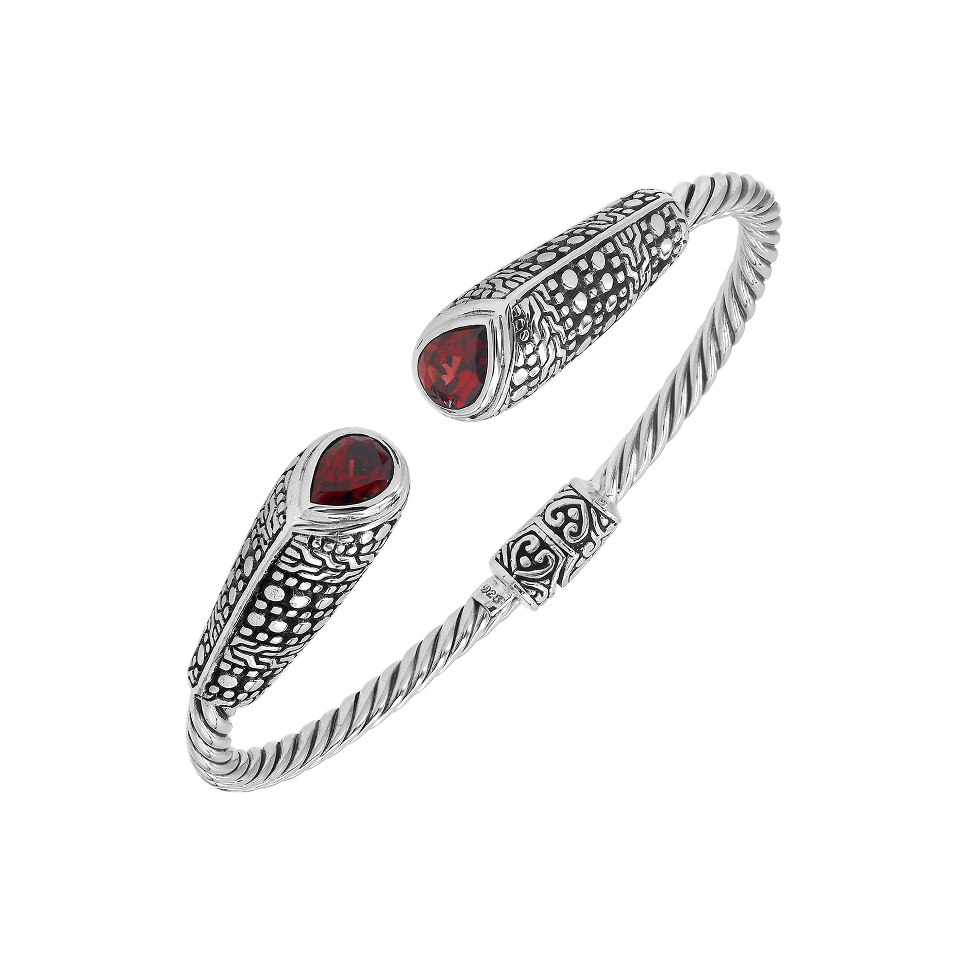 Elegant sterling silver open bangle with garnet quartz accents and Balinese dot design