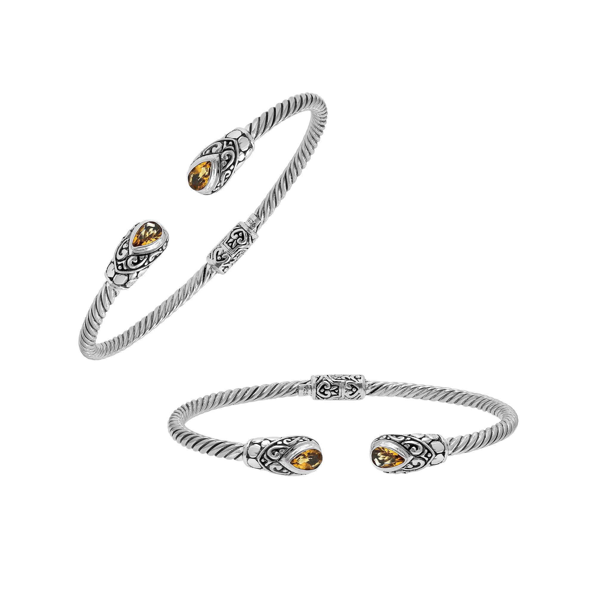 Elegant sterling silver open bangle with citrine quartz teardrop stones from India.