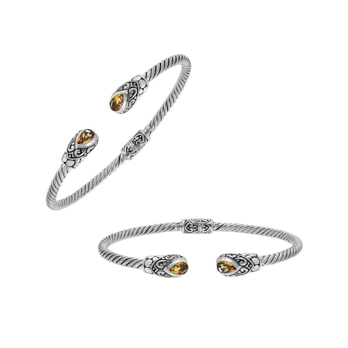 Elegant sterling silver open bangle with citrine quartz teardrop stones from India.