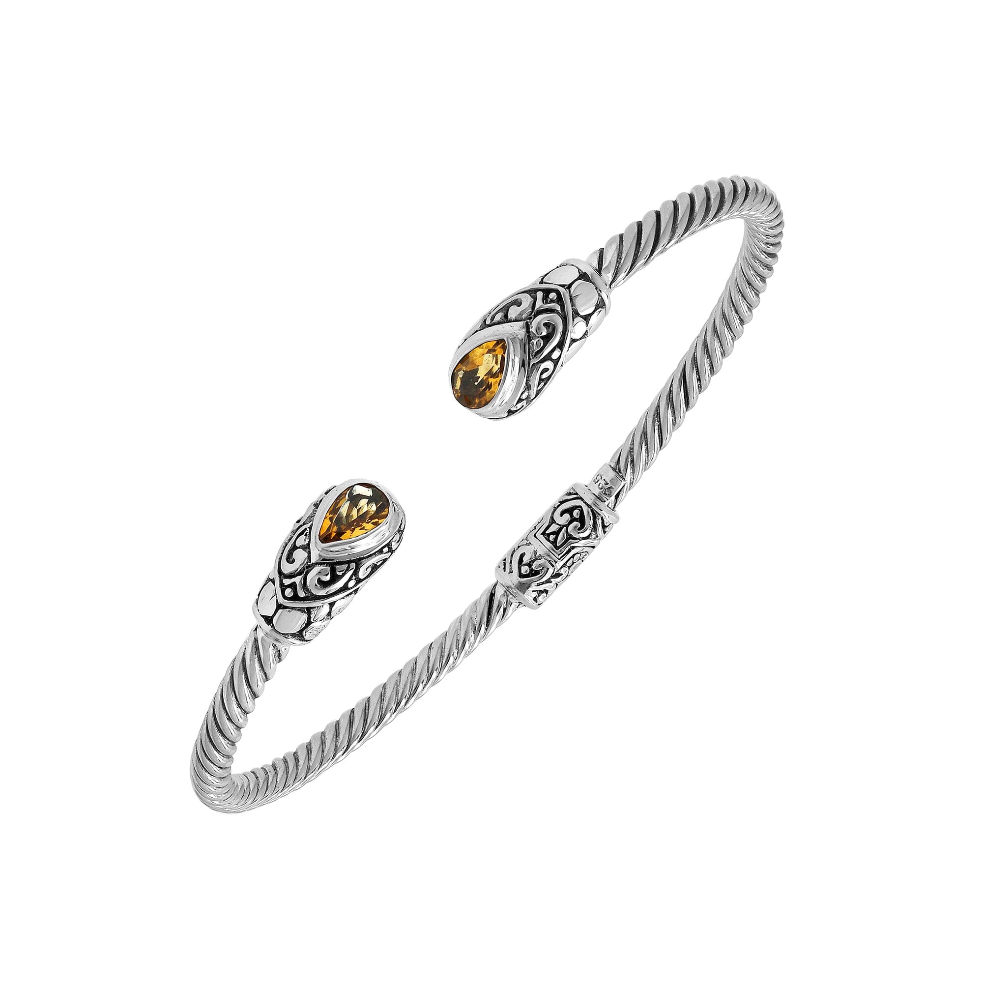 Elegant sterling silver open bangle with citrine quartz teardrop stones from India.