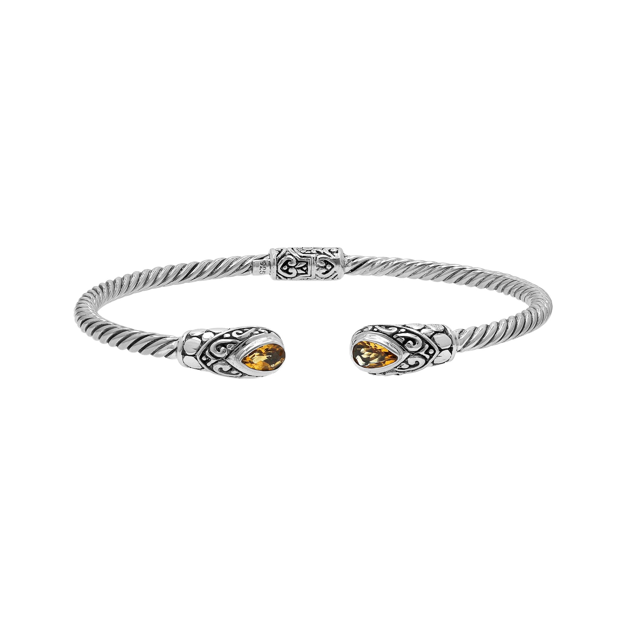 Elegant sterling silver open bangle with citrine quartz teardrop stones from India.