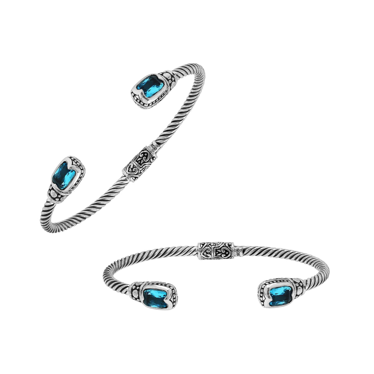 Sterling silver Balinese cuff bangle with Blue Topaz Quartz accents and intricate scroll design.