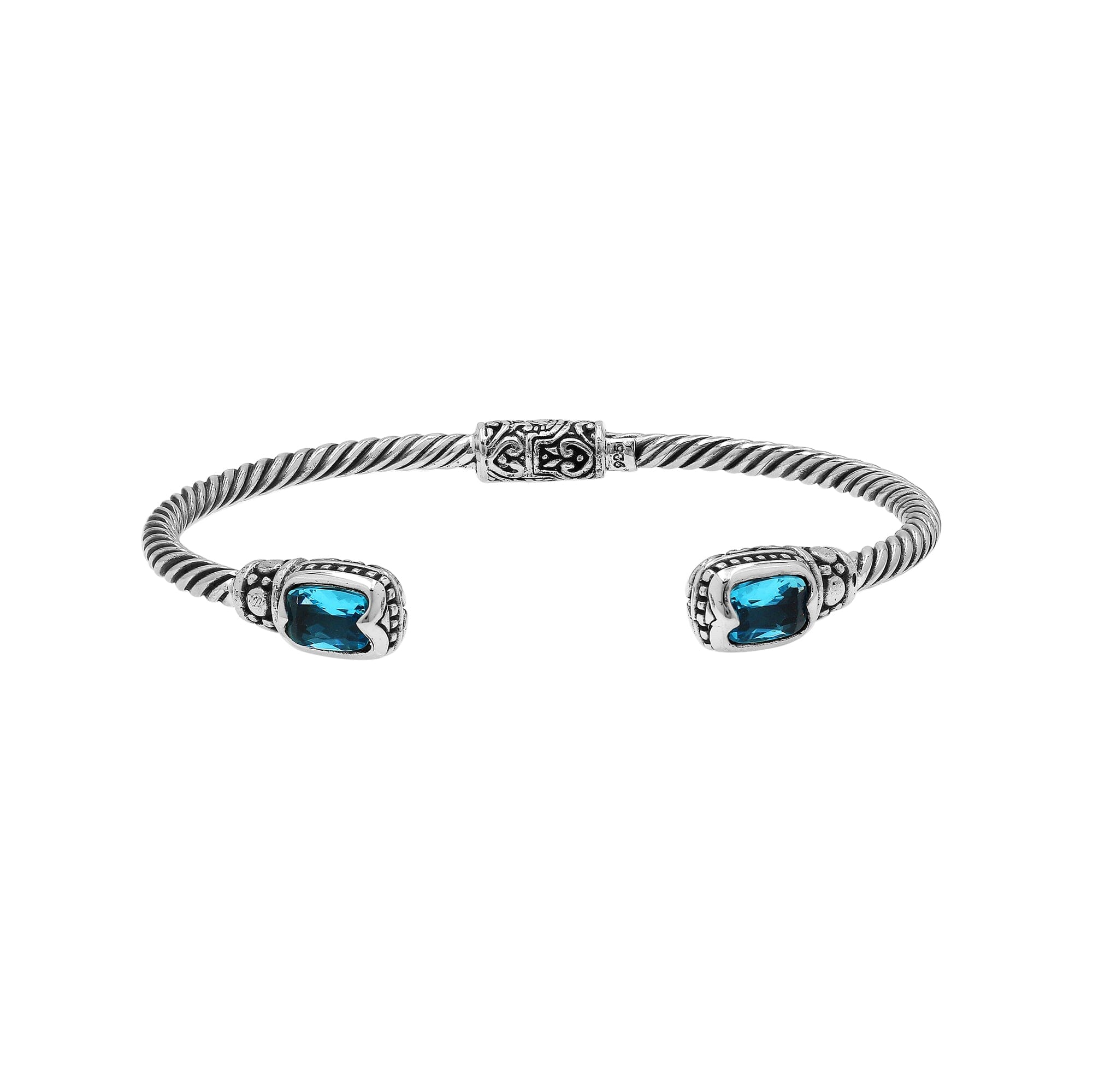 Sterling silver Balinese cuff bangle with Blue Topaz Quartz accents and intricate scroll design.