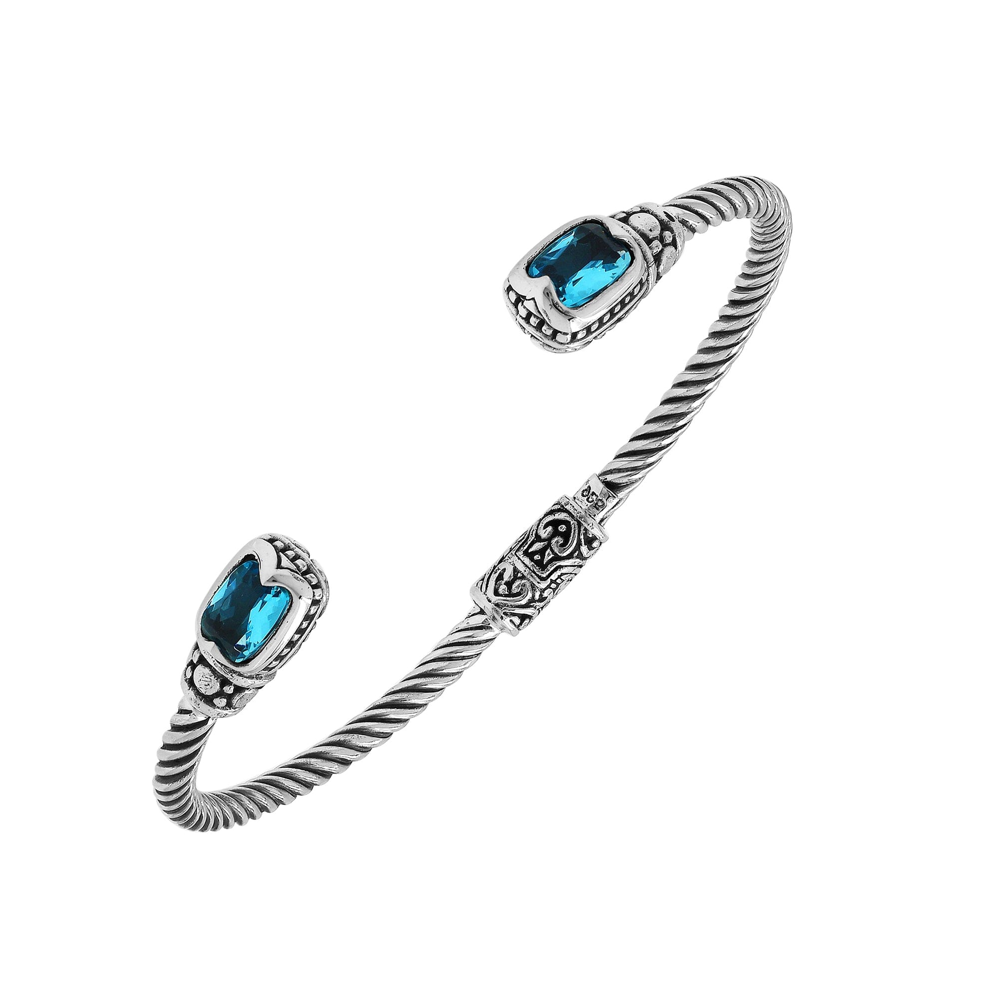 Sterling silver Balinese cuff bangle with Blue Topaz Quartz accents and intricate scroll design.