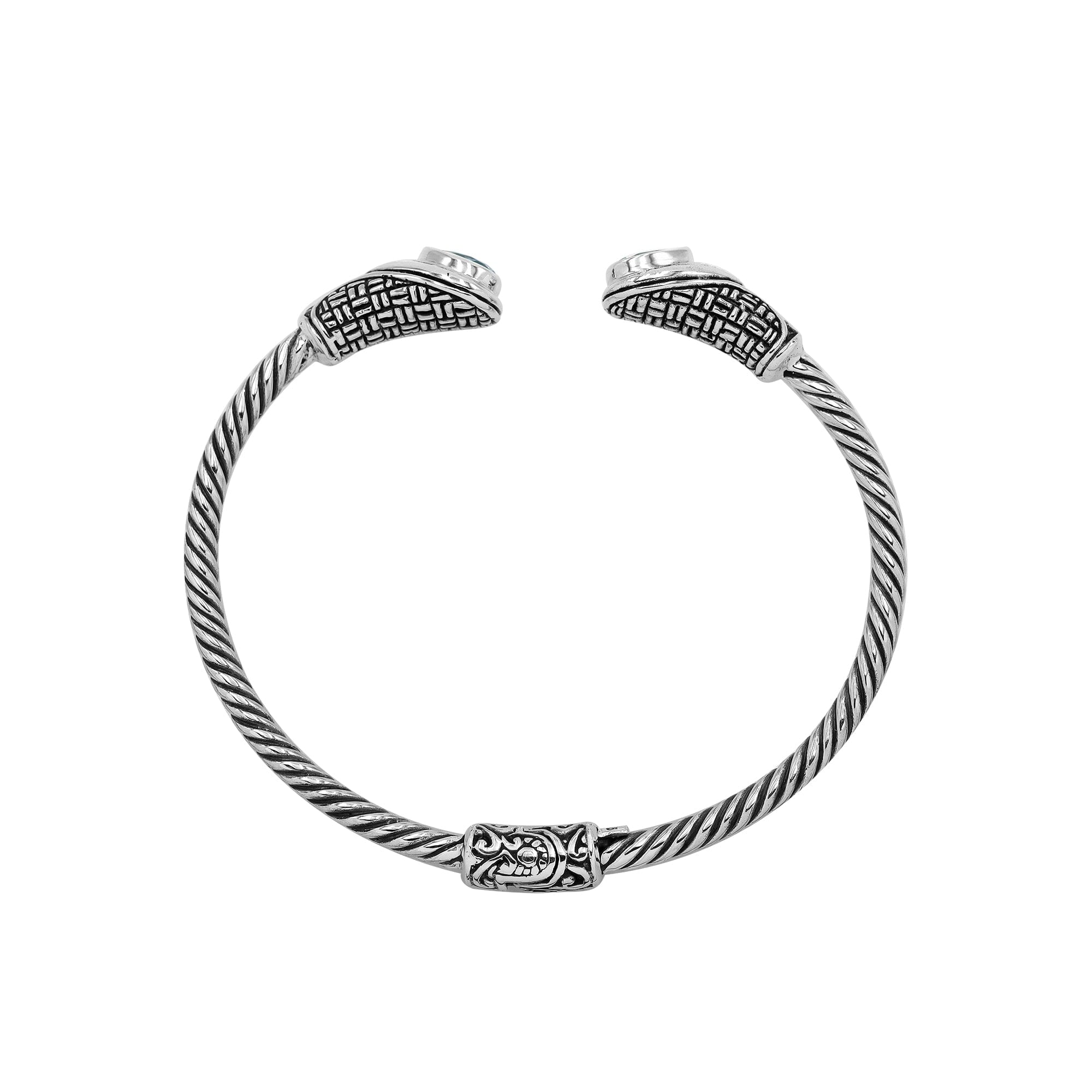 Sterling silver Balinese cuff bangle with Blue Topaz Quartz accents and ornate scroll design.