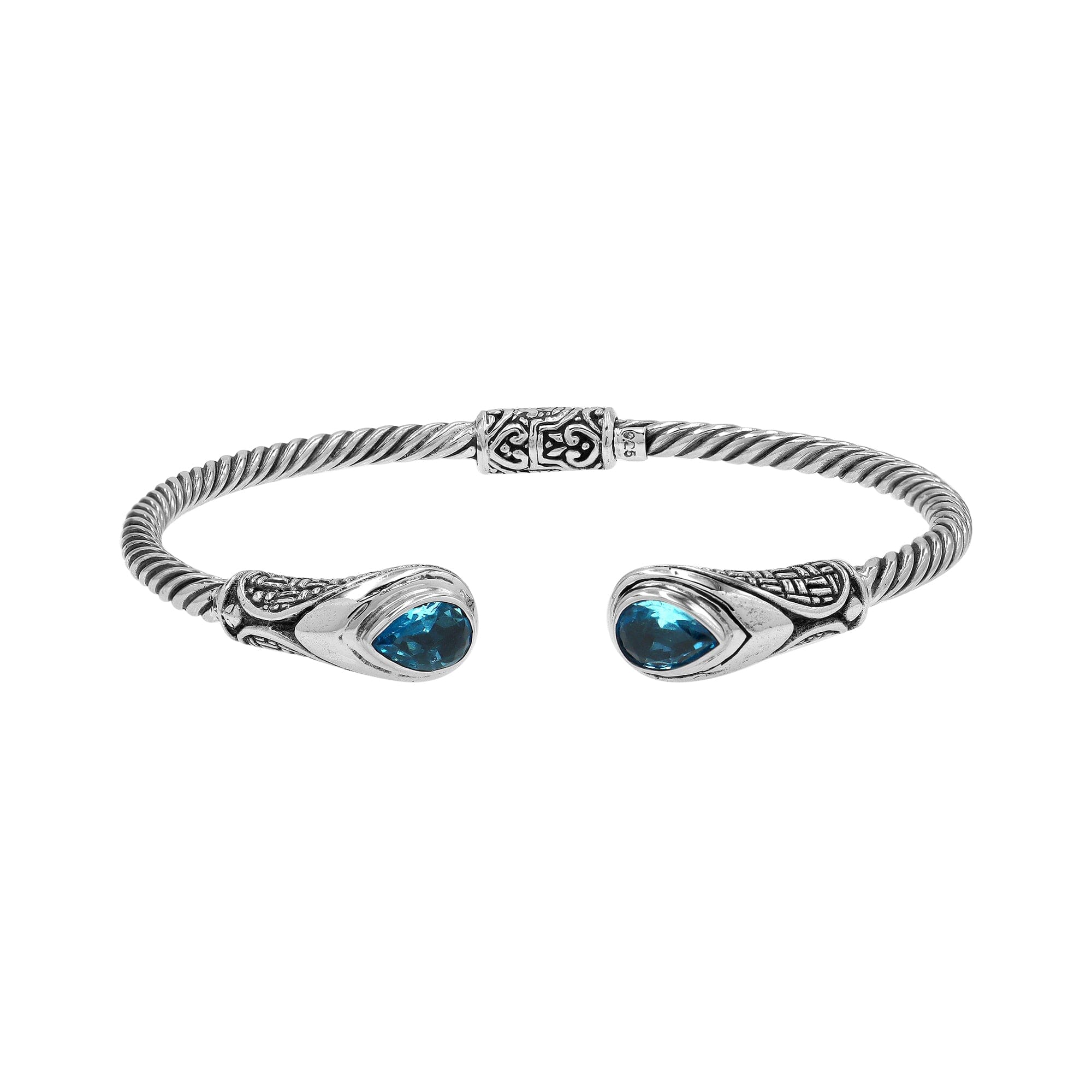 Sterling silver Balinese cuff bangle with Blue Topaz Quartz accents and ornate scroll design.