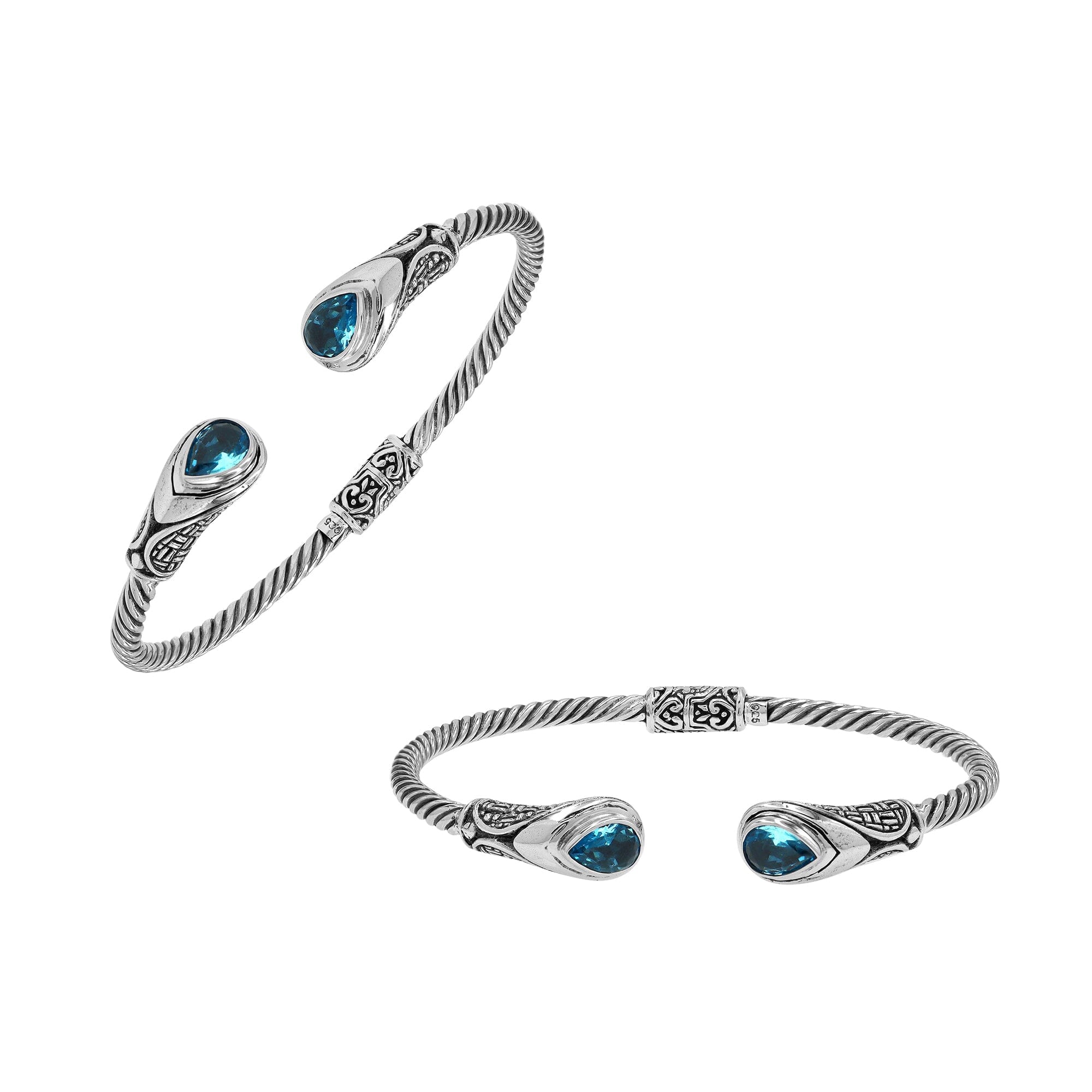 Sterling silver Balinese cuff bangle with Blue Topaz Quartz accents and ornate scroll design.
