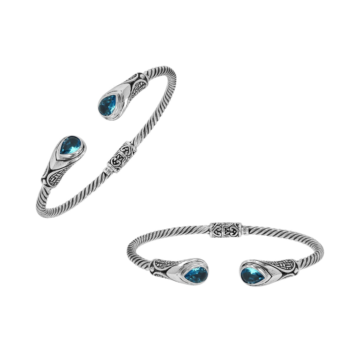 Sterling silver Balinese cuff bangle with Blue Topaz Quartz accents and ornate scroll design.
