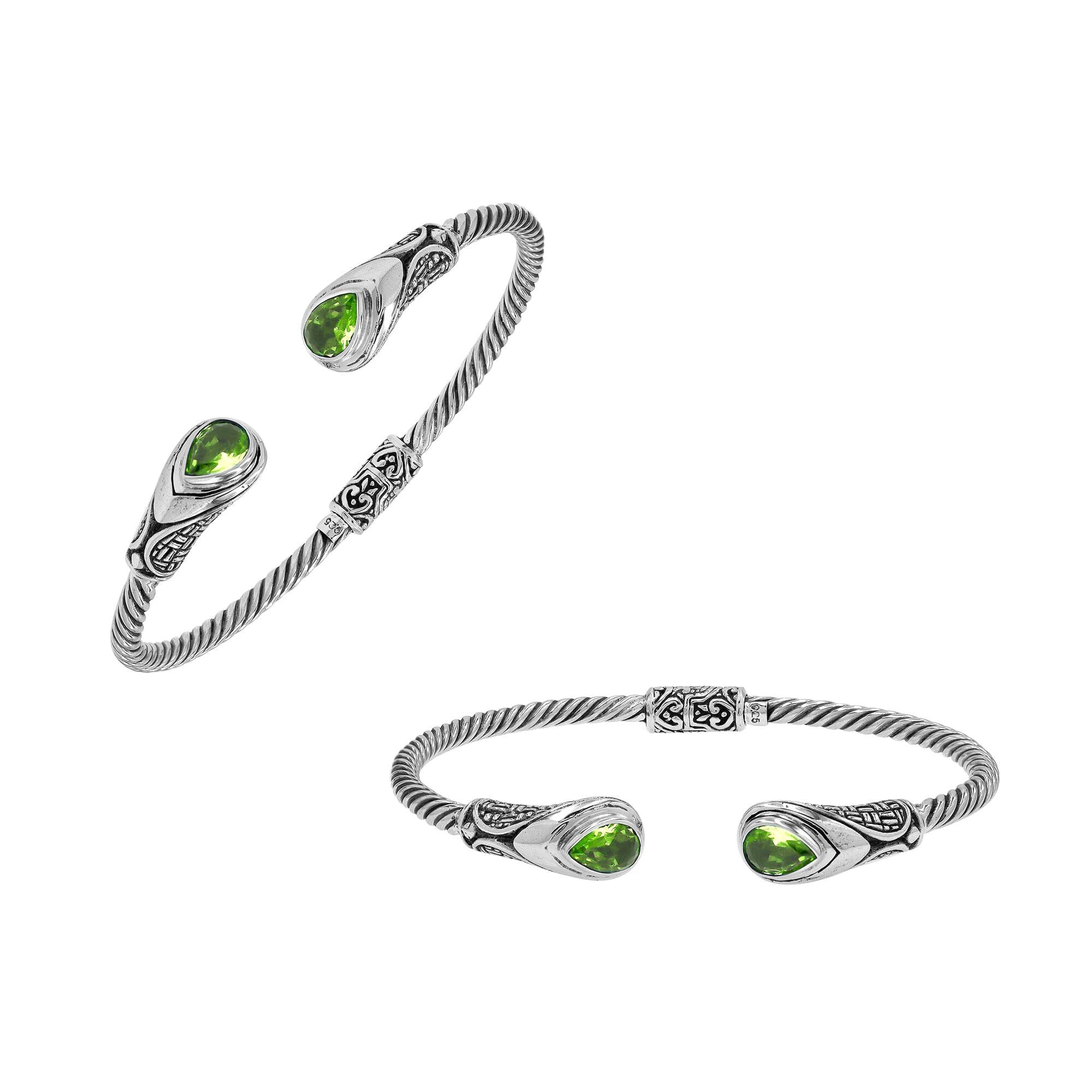 Sterling silver Balinese cuff bangle with Peridot Quartz accents and ornate scroll design.
