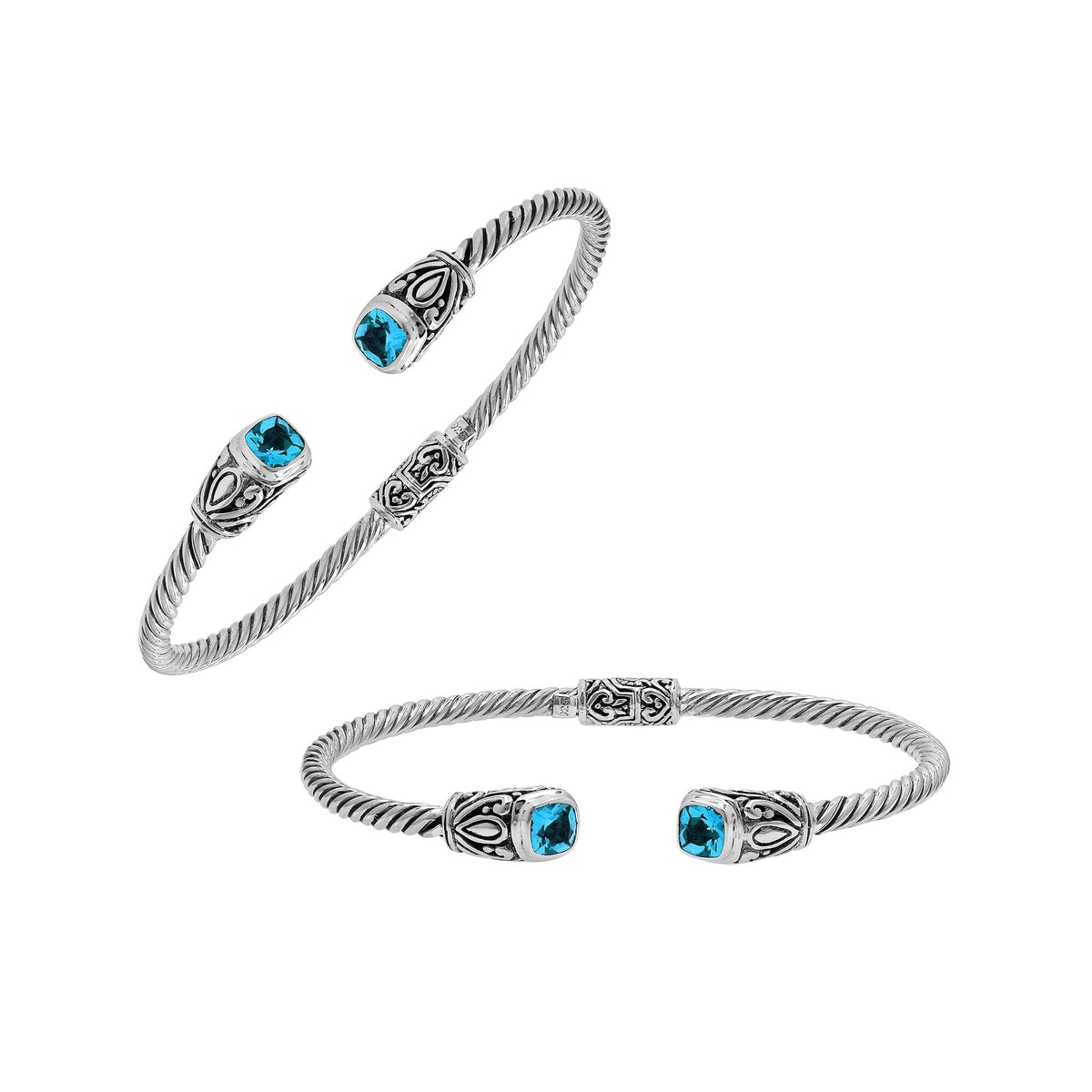 Sterling silver Balinese cuff bangle with Blue Topaz Quartz accents and ornate scroll design.