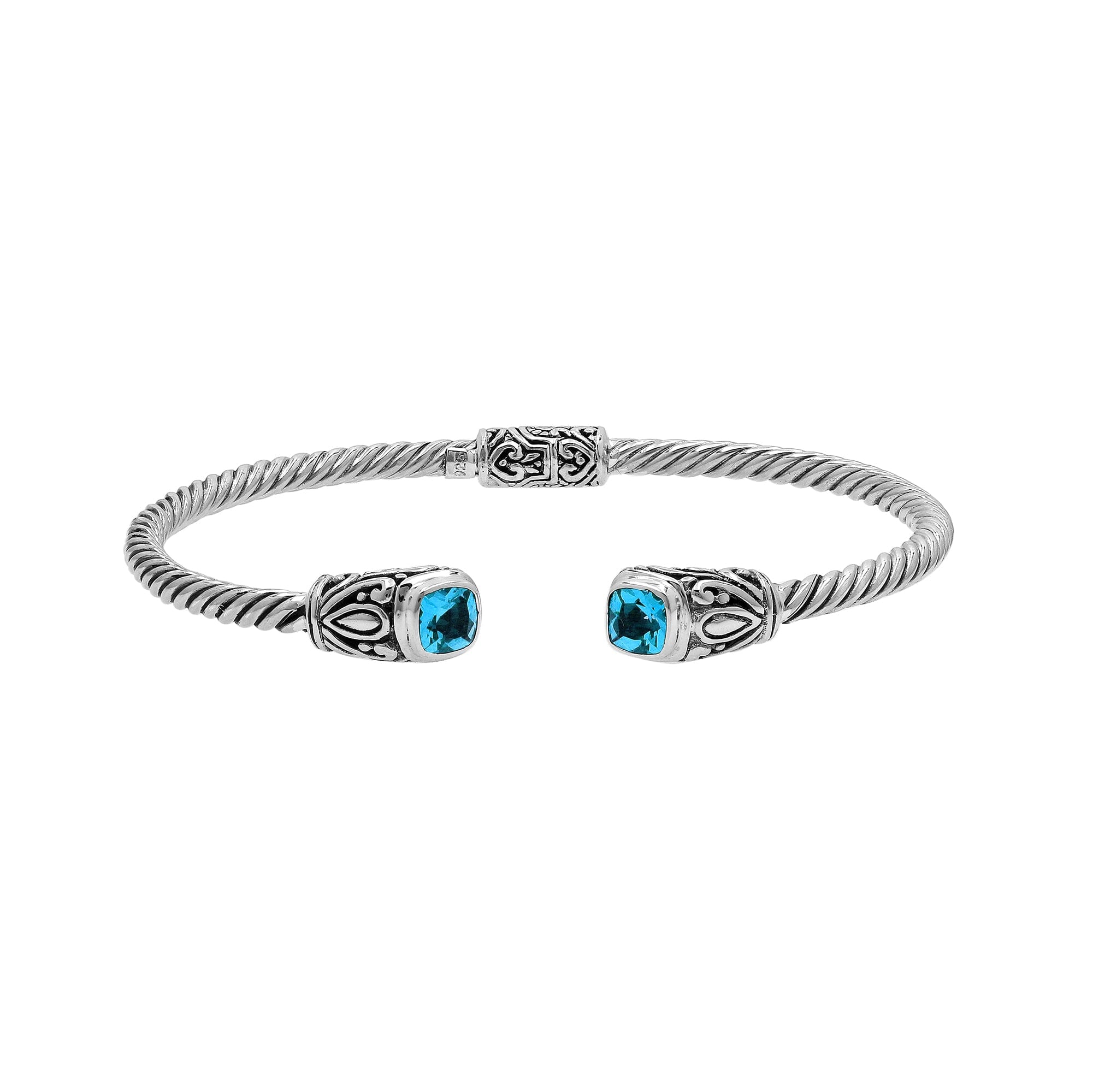 Sterling silver Balinese cuff bangle with Blue Topaz Quartz accents and ornate scroll design.