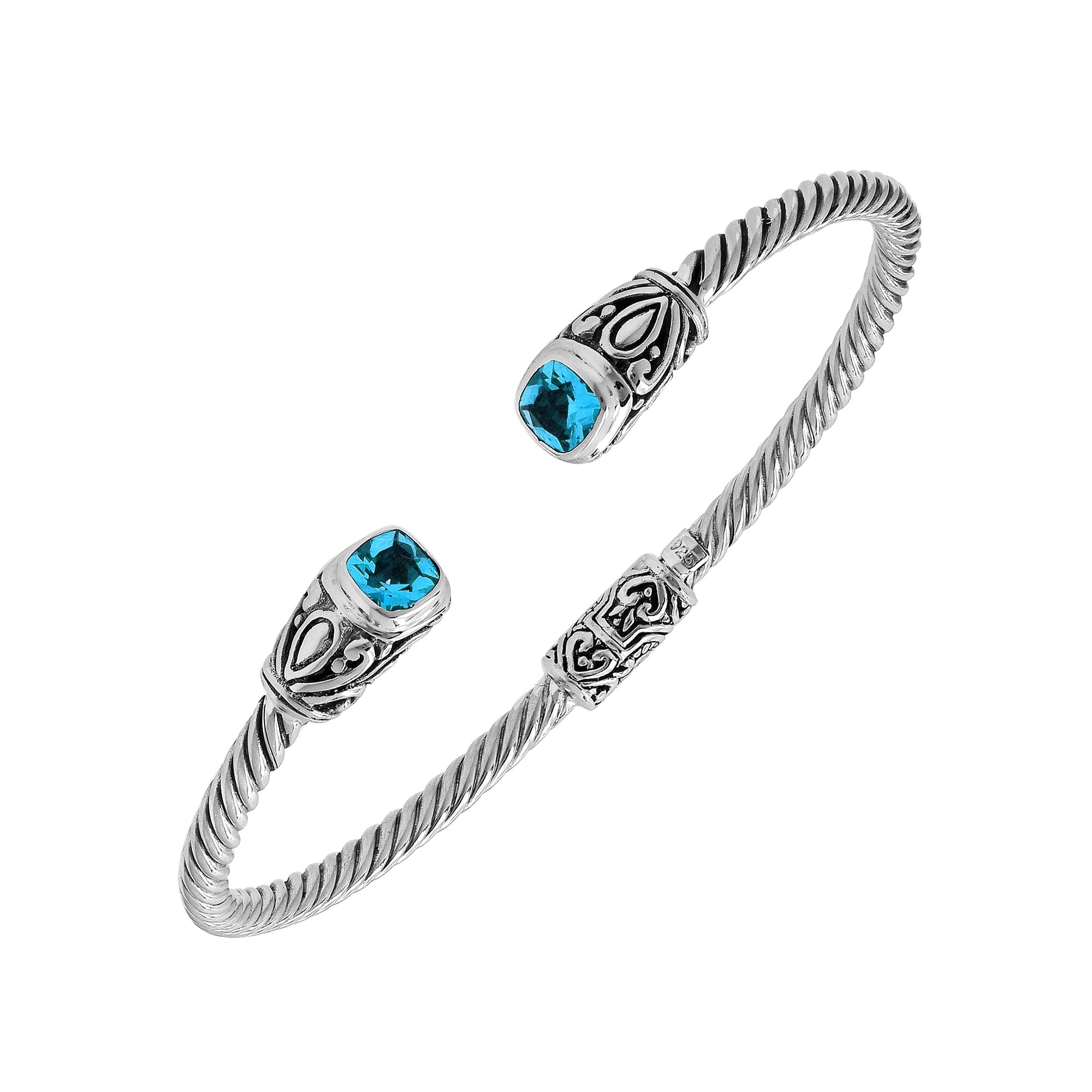 Sterling silver Balinese cuff bangle with Blue Topaz Quartz accents and ornate scroll design.