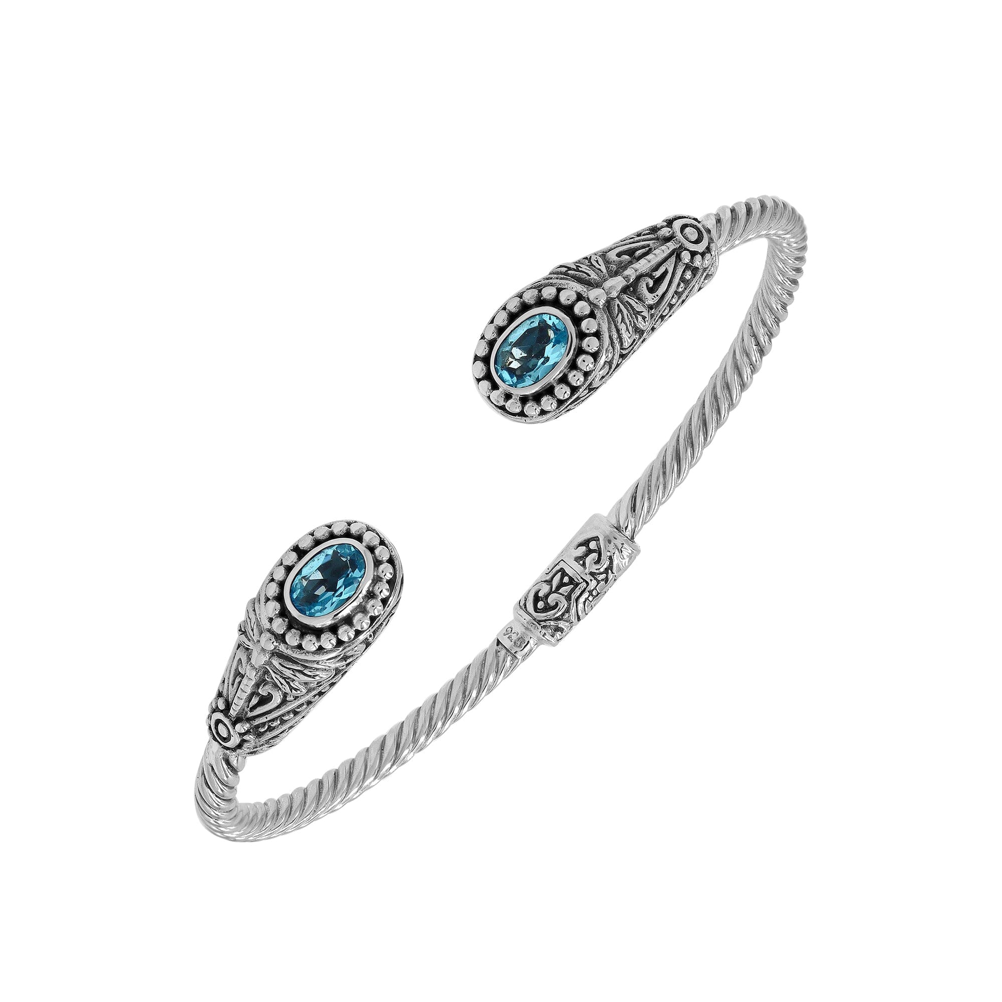 Sterling silver Balinese cuff bangle with Blue Topaz Quartz accents and ornate scroll design.