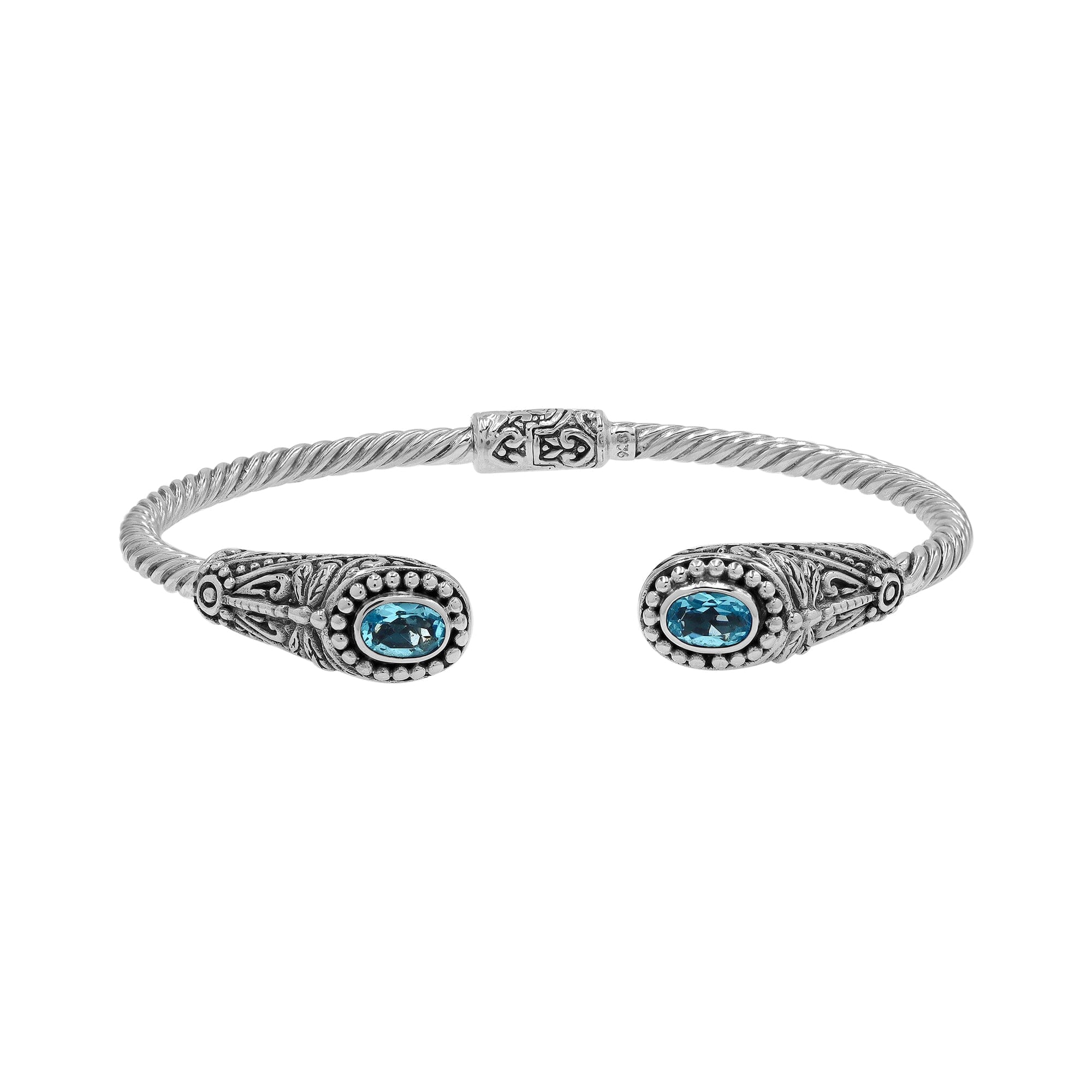 Sterling silver Balinese cuff bangle with Blue Topaz Quartz accents and ornate scroll design.