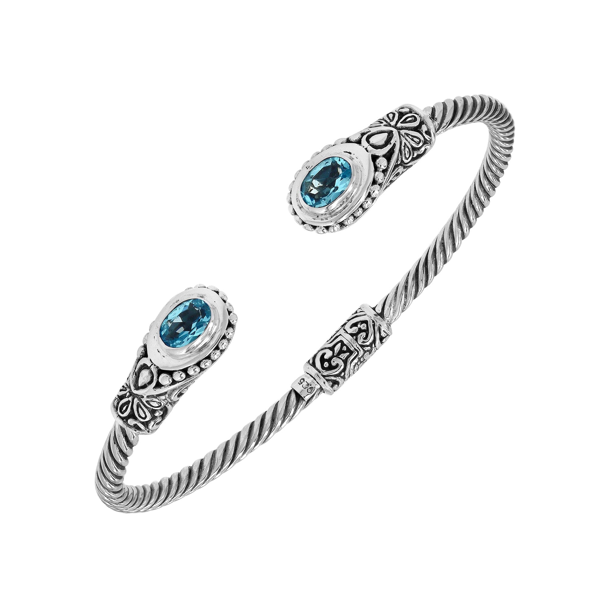 Sterling silver Balinese bangle with Blue Topaz Quartz stones and beaded scroll design.
