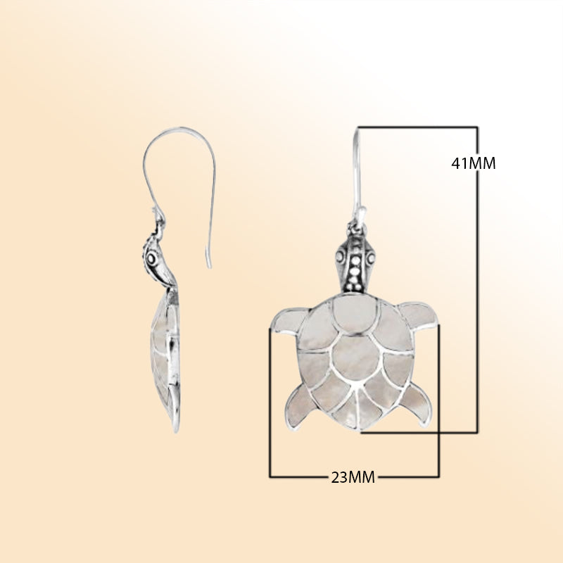 Sterling silver turtle earrings with shimmering mother of pearl inlay and artisan silver detailing
