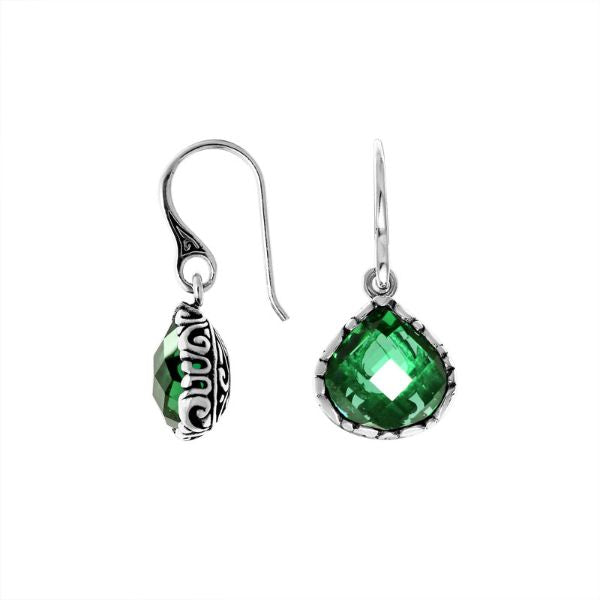 A pair of elegant 925 sterling silver earrings featuring faceted Green Quartz teardrops with Balinese filigree accents and modern earwire hook design.