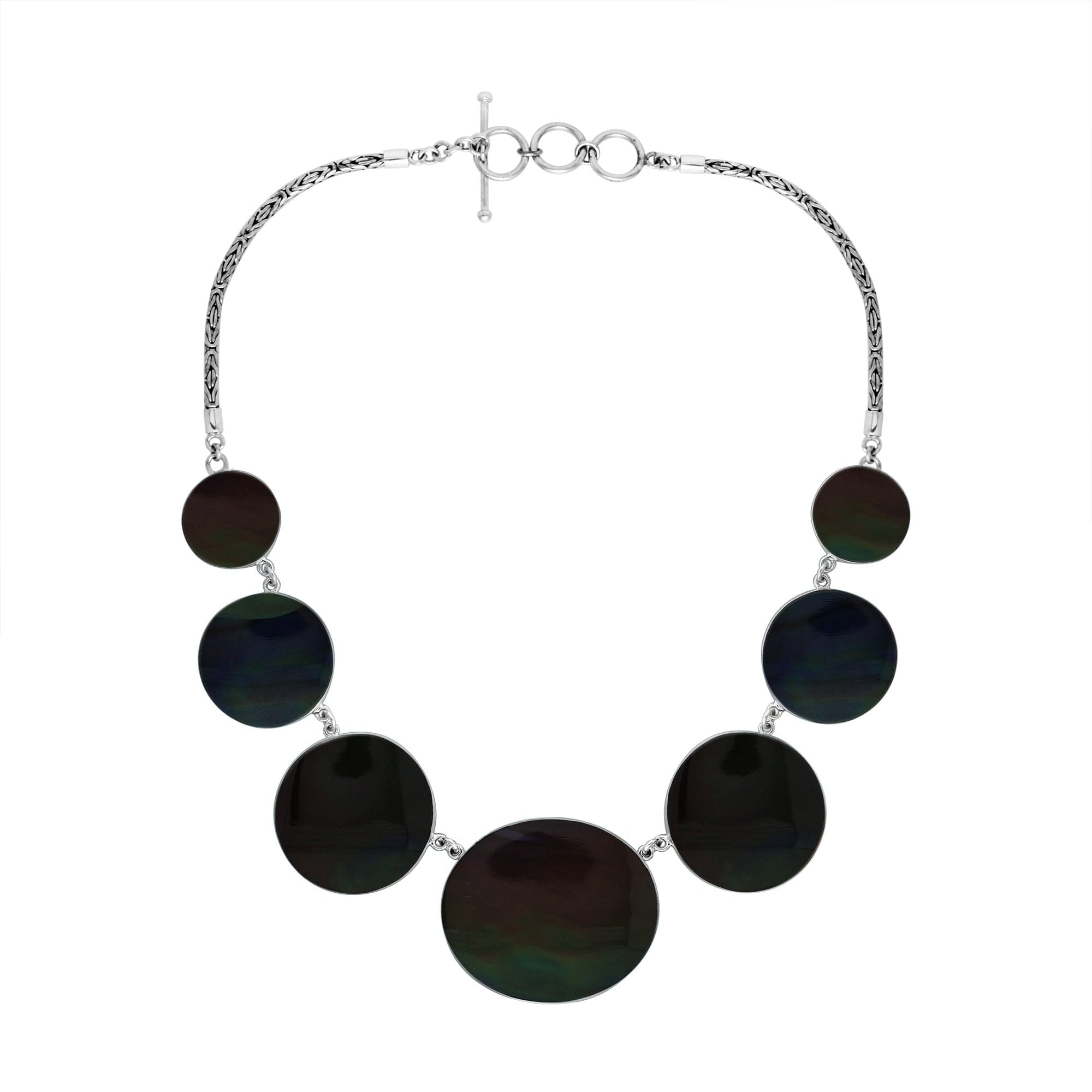Women’s sterling silver necklace with black shell discs and Bali-inspired accents.