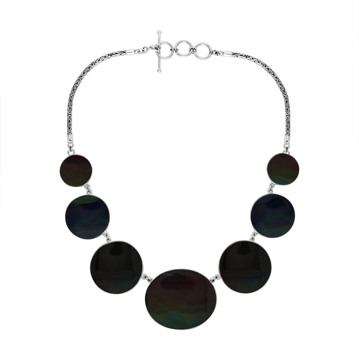 Women’s sterling silver necklace with black shell discs and Bali-inspired accents.