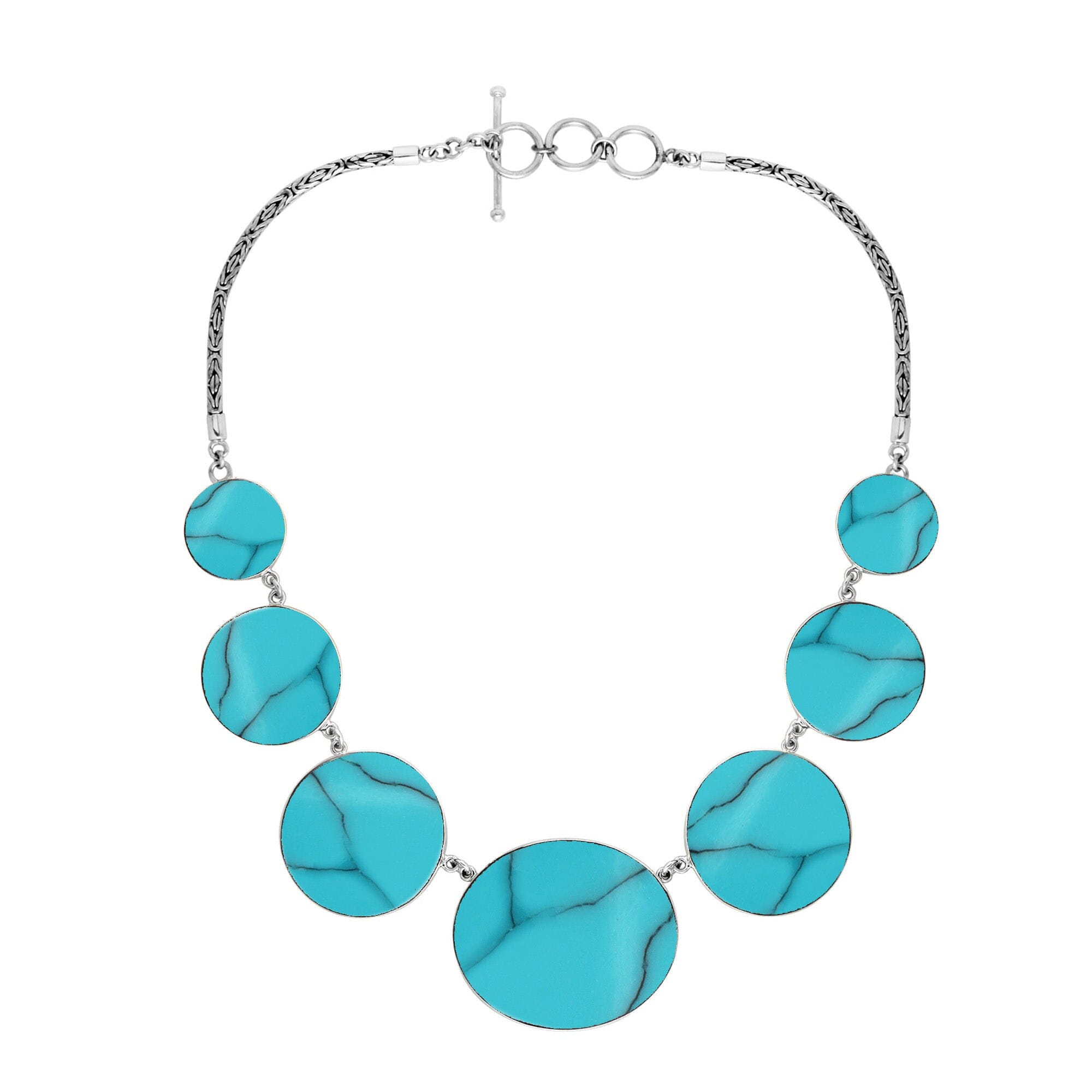 Women’s sterling silver necklace with turquoise shell discs and Bali-inspired accents.
