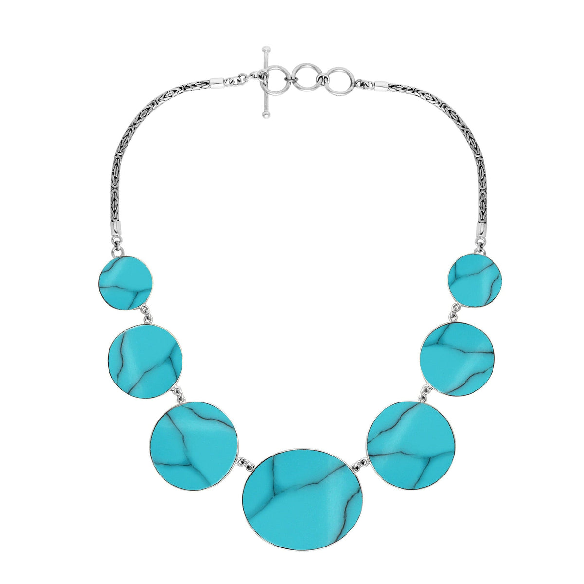 Women’s sterling silver necklace with turquoise shell discs and Bali-inspired accents.