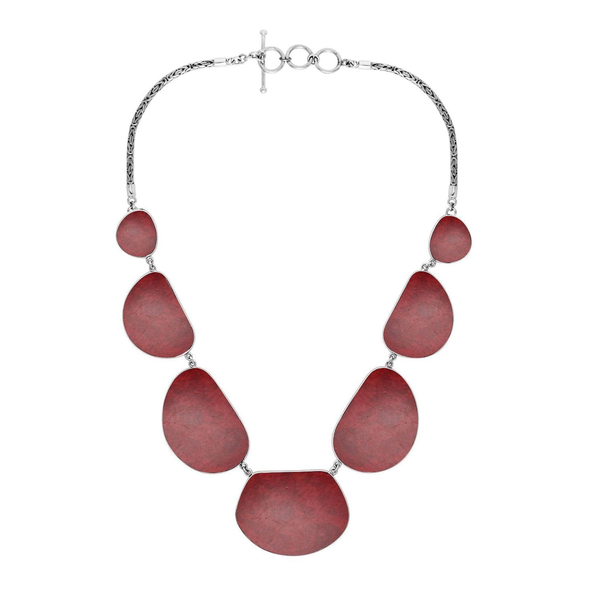 Women’s sterling silver necklace with freeform coral stones and Bali-inspired accents.