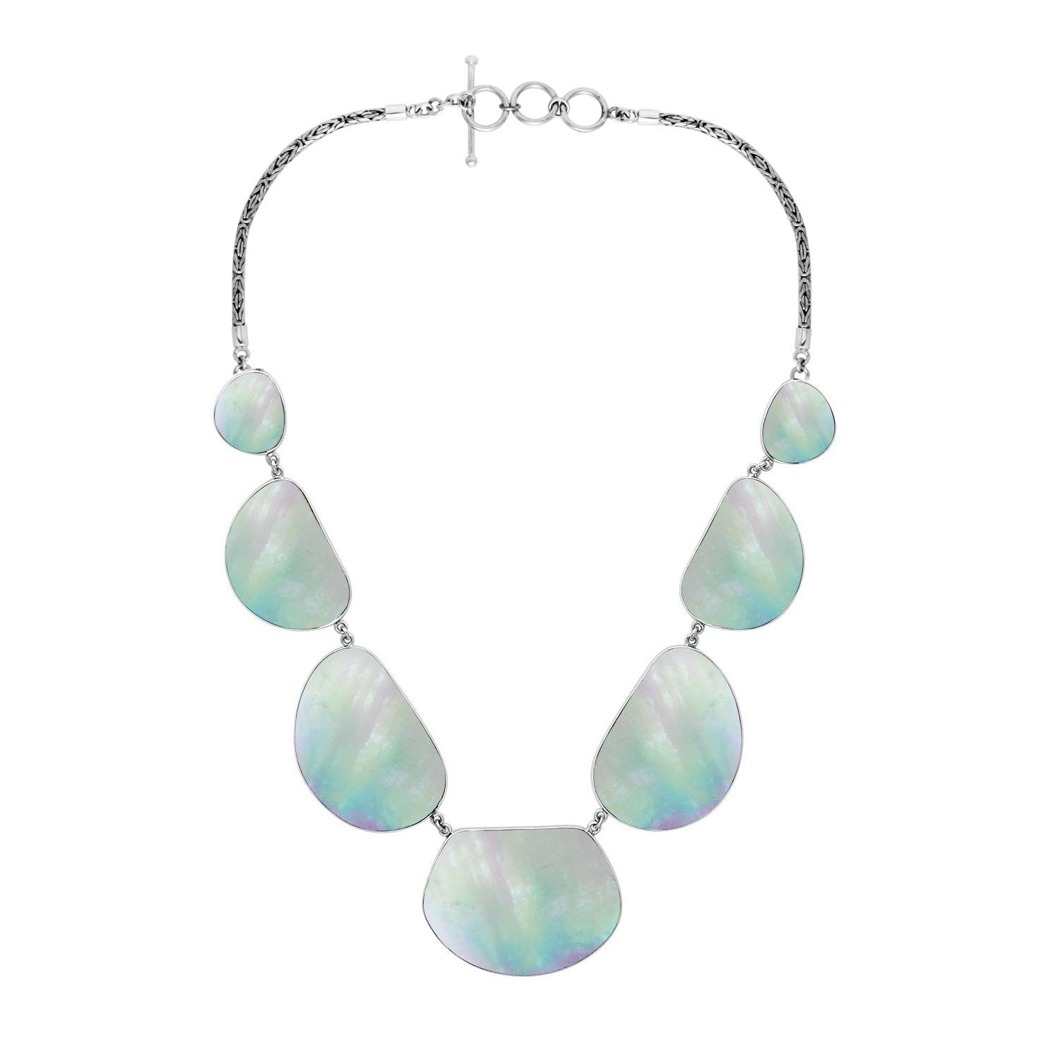 Women’s sterling silver necklace with freeform Mother of Pearl stones and Bali-inspired accents.