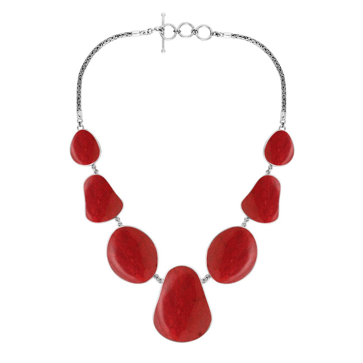 Women’s sterling silver necklace with teardrop coral stones and Bali-inspired accents.