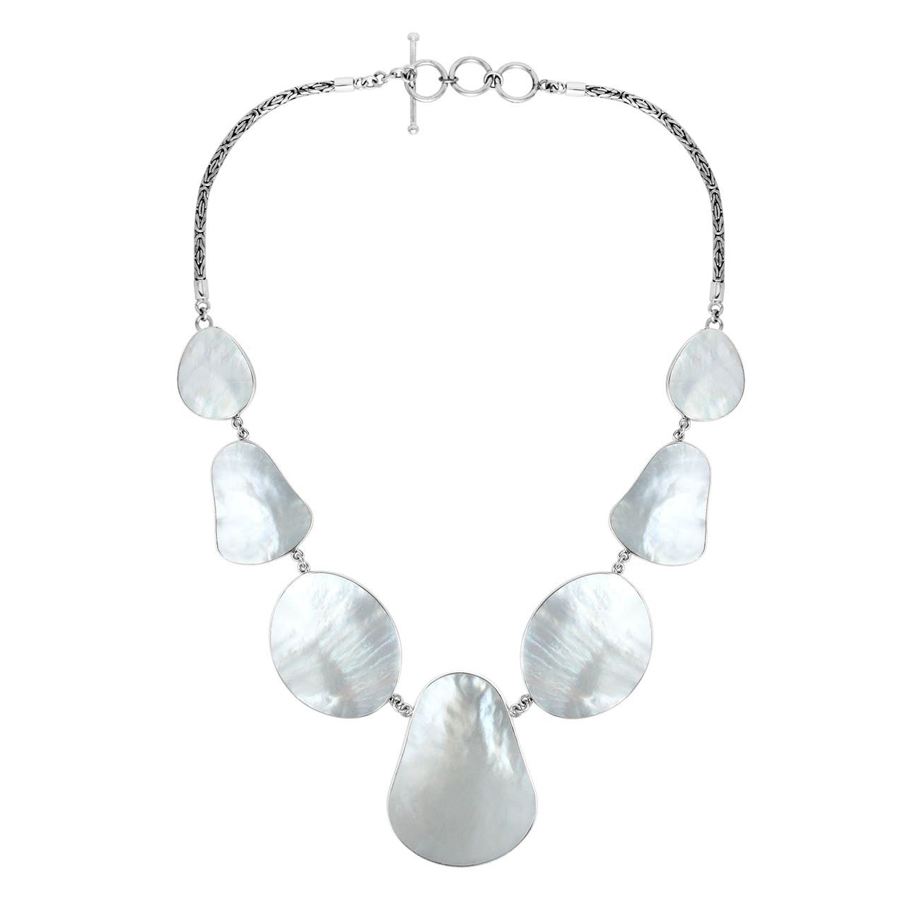 Women’s sterling silver necklace with teardrop Mother of Pearl stones and Bali-inspired accents.