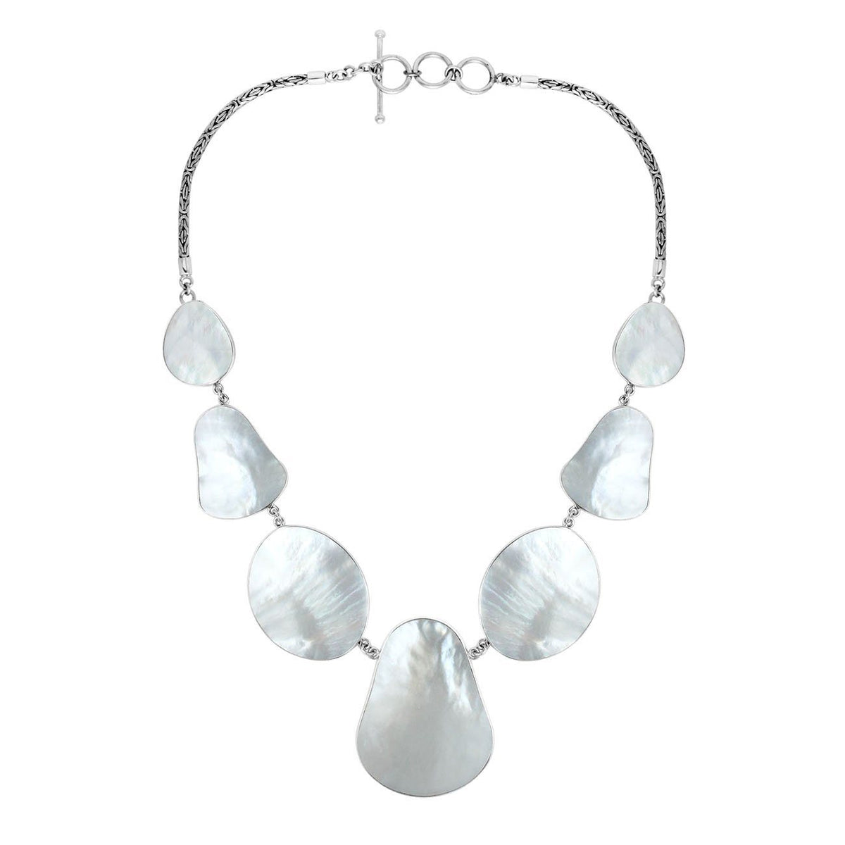 Women’s sterling silver necklace with teardrop Mother of Pearl stones and Bali-inspired accents.