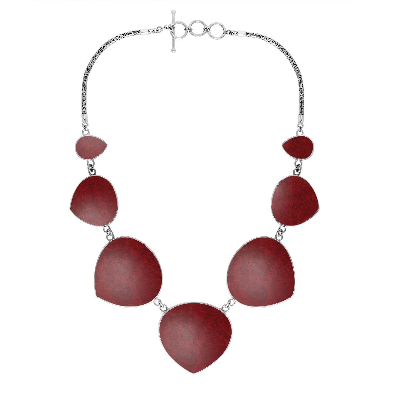 Women’s sterling silver necklace with heart-shape coral stones and Bali-inspired accents.