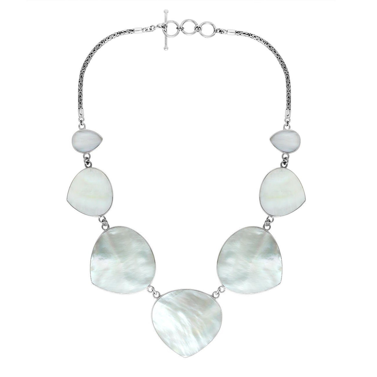 Women’s sterling silver necklace with heart-shape Mother of Pearl stones and Bali-inspired accents.