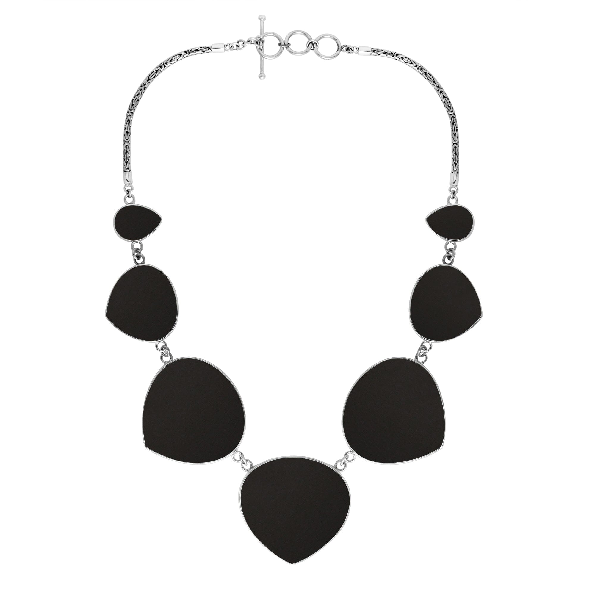Women’s sterling silver necklace with heart-shape black shell stones and Bali-inspired accents.