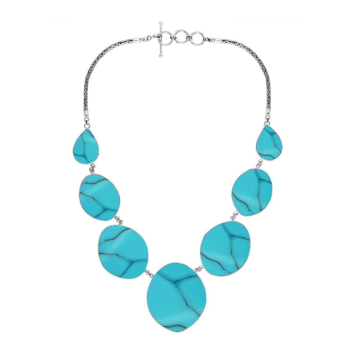 Handcrafted silver necklace with oval and teardrop turquoise shell links, ocean-inspired statement design.