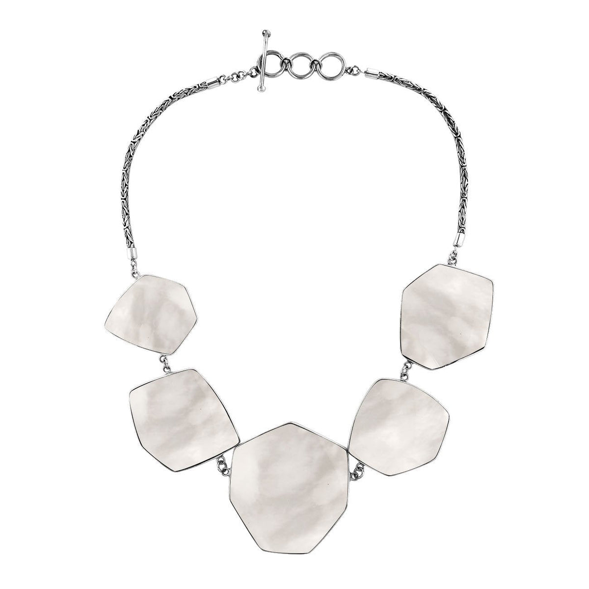 Handcrafted silver necklace with hexagon mother of pearl links in elegant statement design.