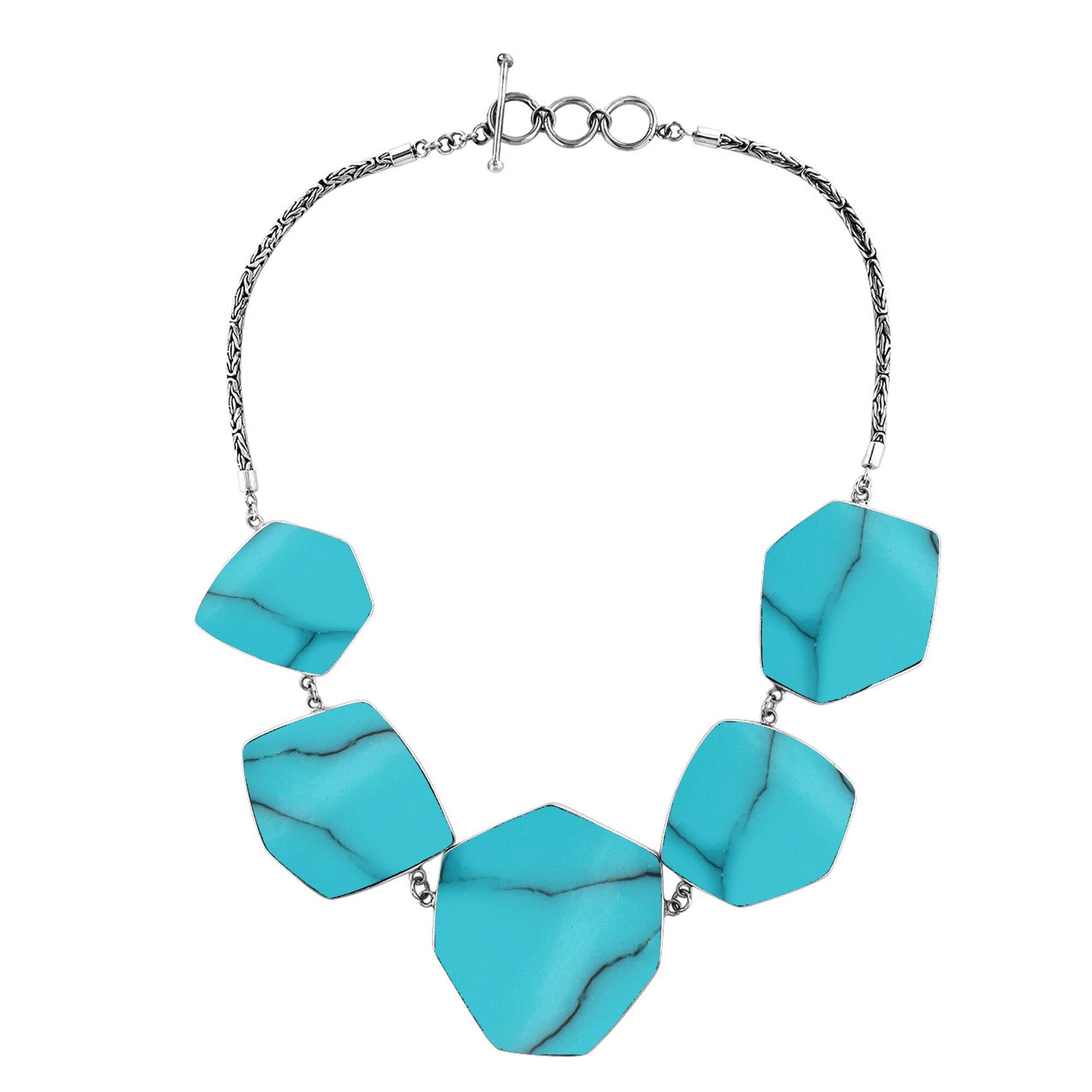 Handcrafted silver necklace with hexagon turquoise shell links in ocean-inspired artisan design.